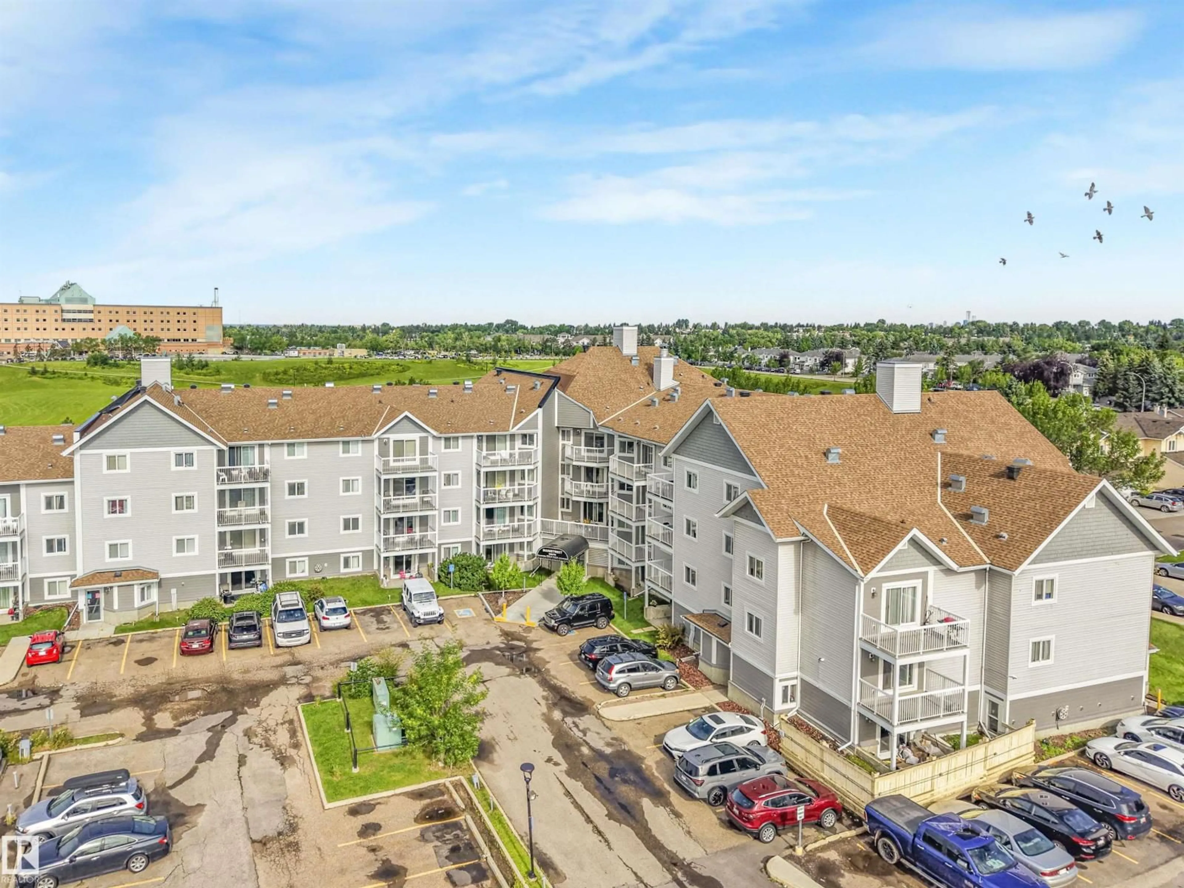 A pic from outside/outdoor area/front of a property/back of a property/a pic from drone, city buildings view from balcony for #410 - 5065 31 AV, Edmonton Alberta T6L6S5