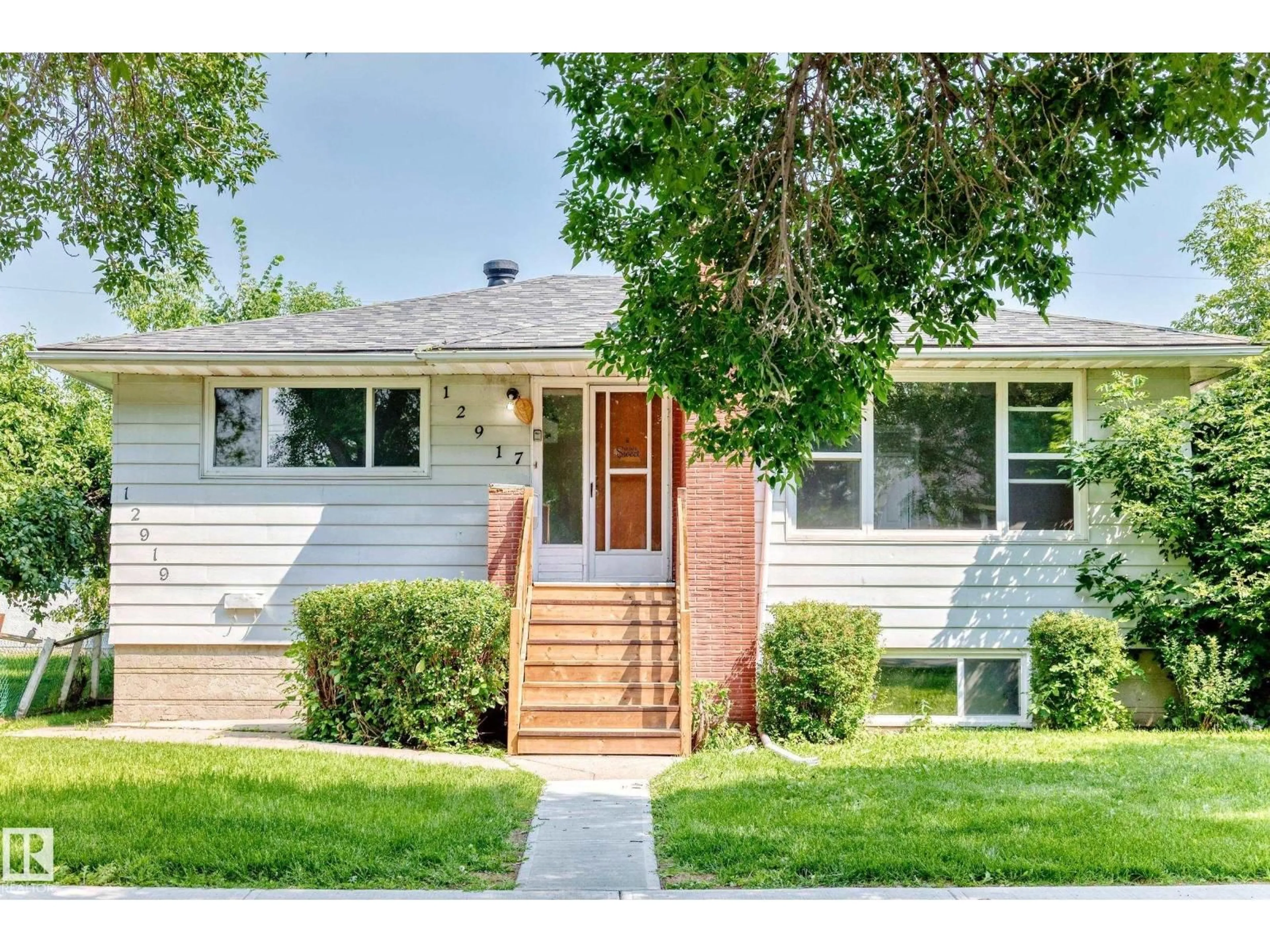 Home with vinyl exterior material, street for NW - 12917 123A ST, Edmonton Alberta T5L0L1
