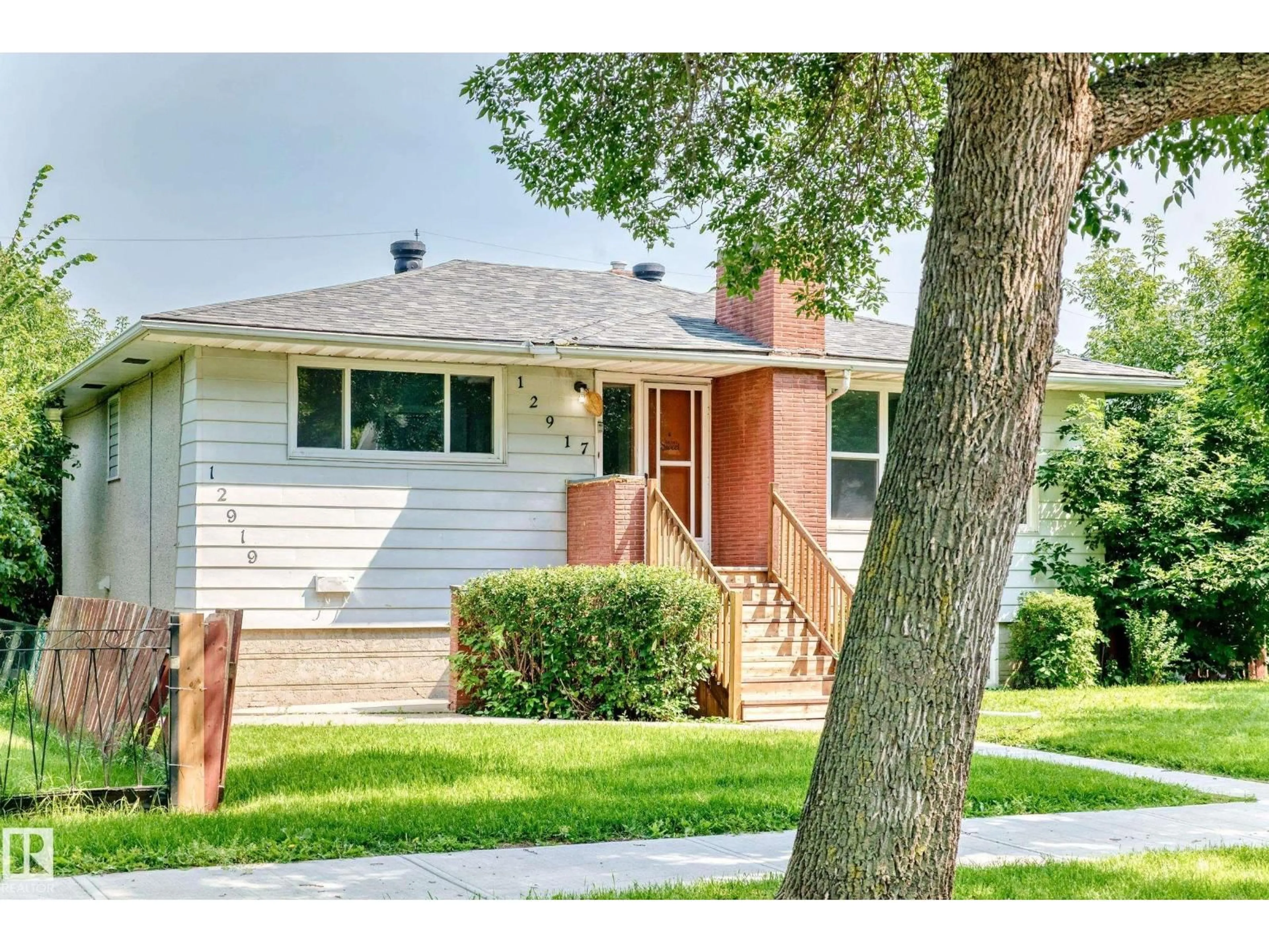 Home with vinyl exterior material, street for NW - 12917 123A ST, Edmonton Alberta T5L0L1