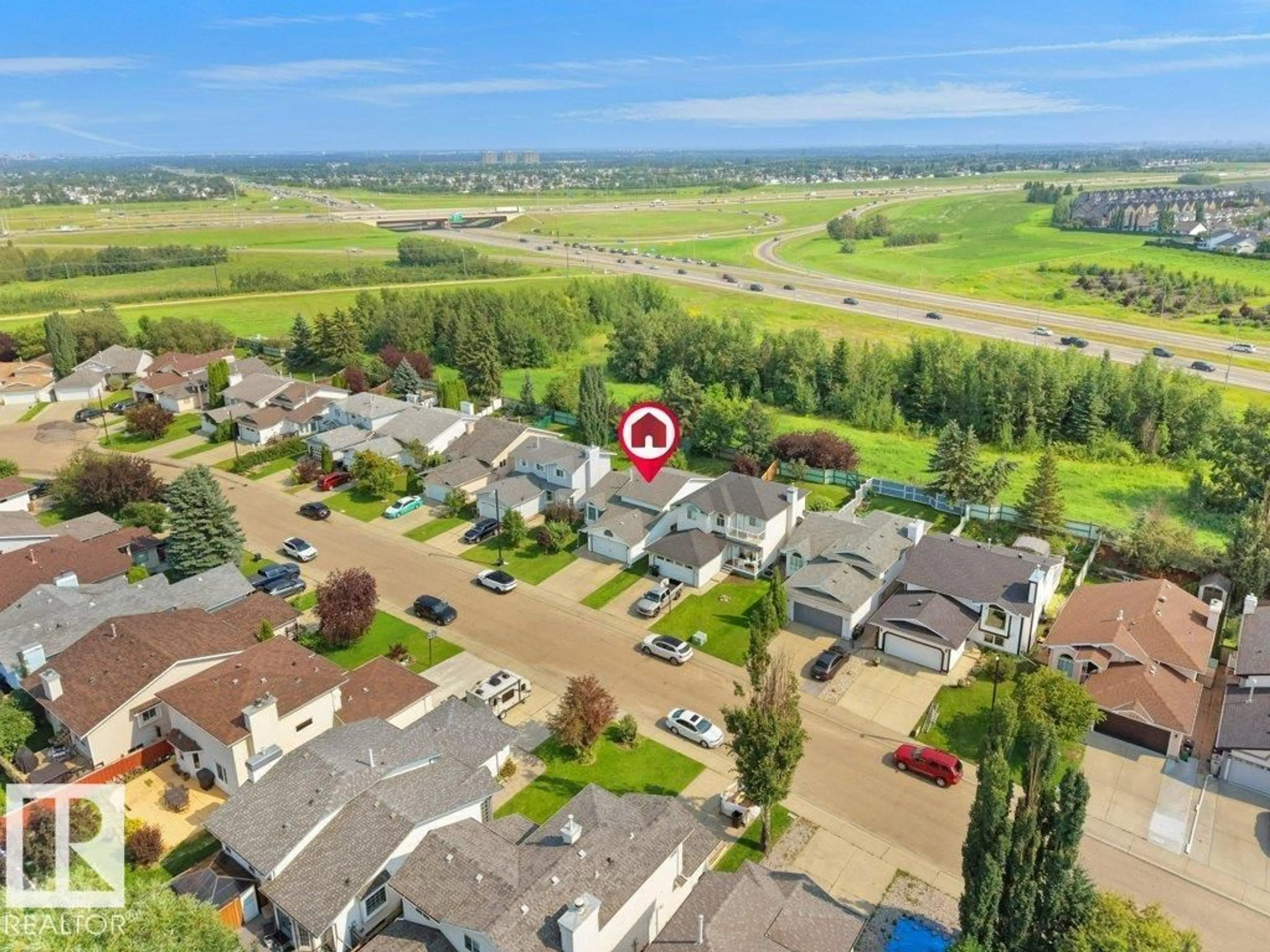 A pic from outside/outdoor area/front of a property/back of a property/a pic from drone, unknown for NW - 330 PEARSON CR, Edmonton Alberta T5T5Y6