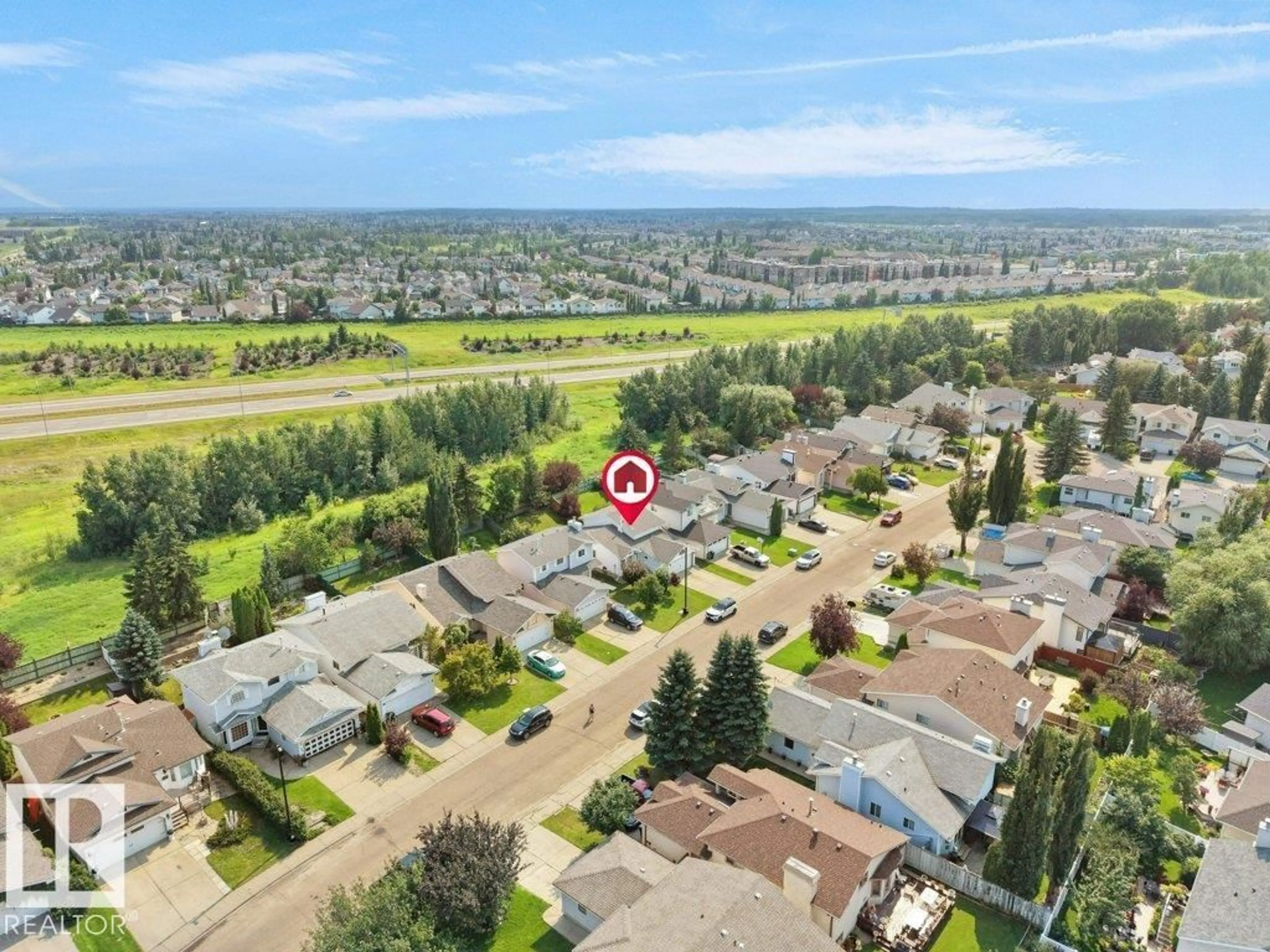 A pic from outside/outdoor area/front of a property/back of a property/a pic from drone, mountain view for NW - 330 PEARSON CR, Edmonton Alberta T5T5Y6