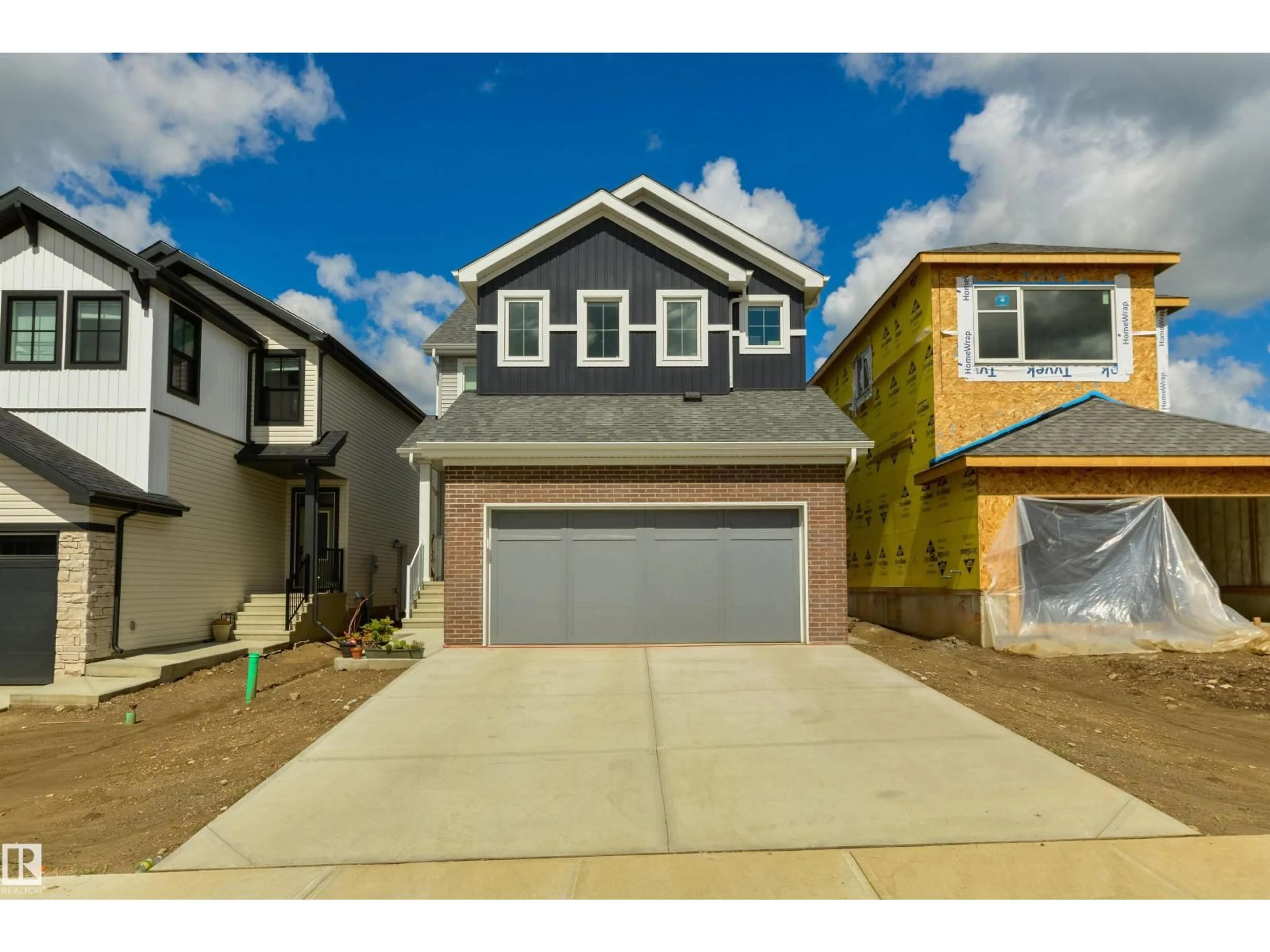 Home with vinyl exterior material, street for 6 COULEE, Ardrossan Alberta T8E0B9