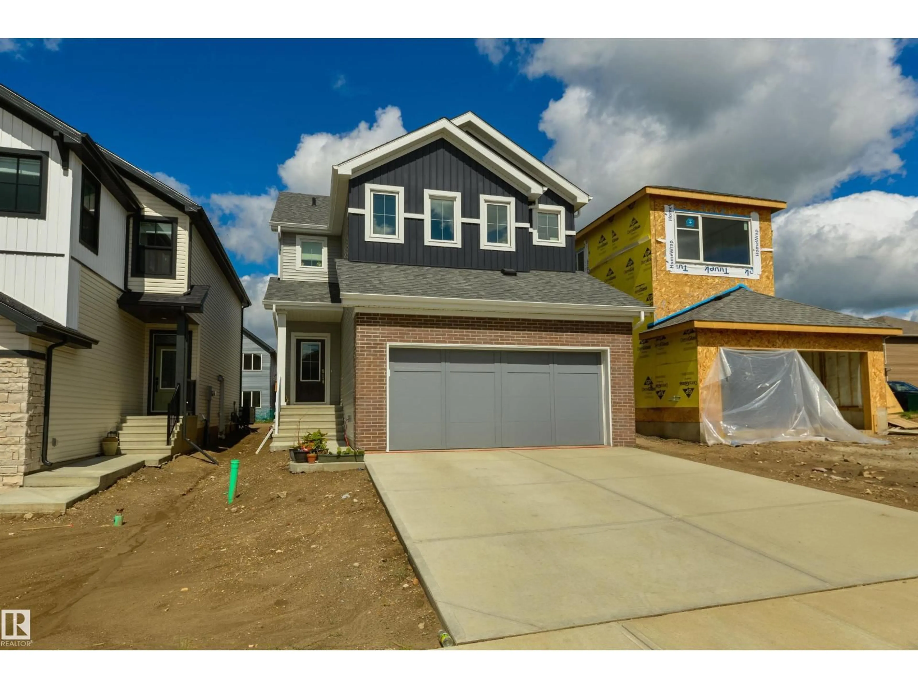 Home with vinyl exterior material, street for 6 COULEE, Ardrossan Alberta T8E0B9