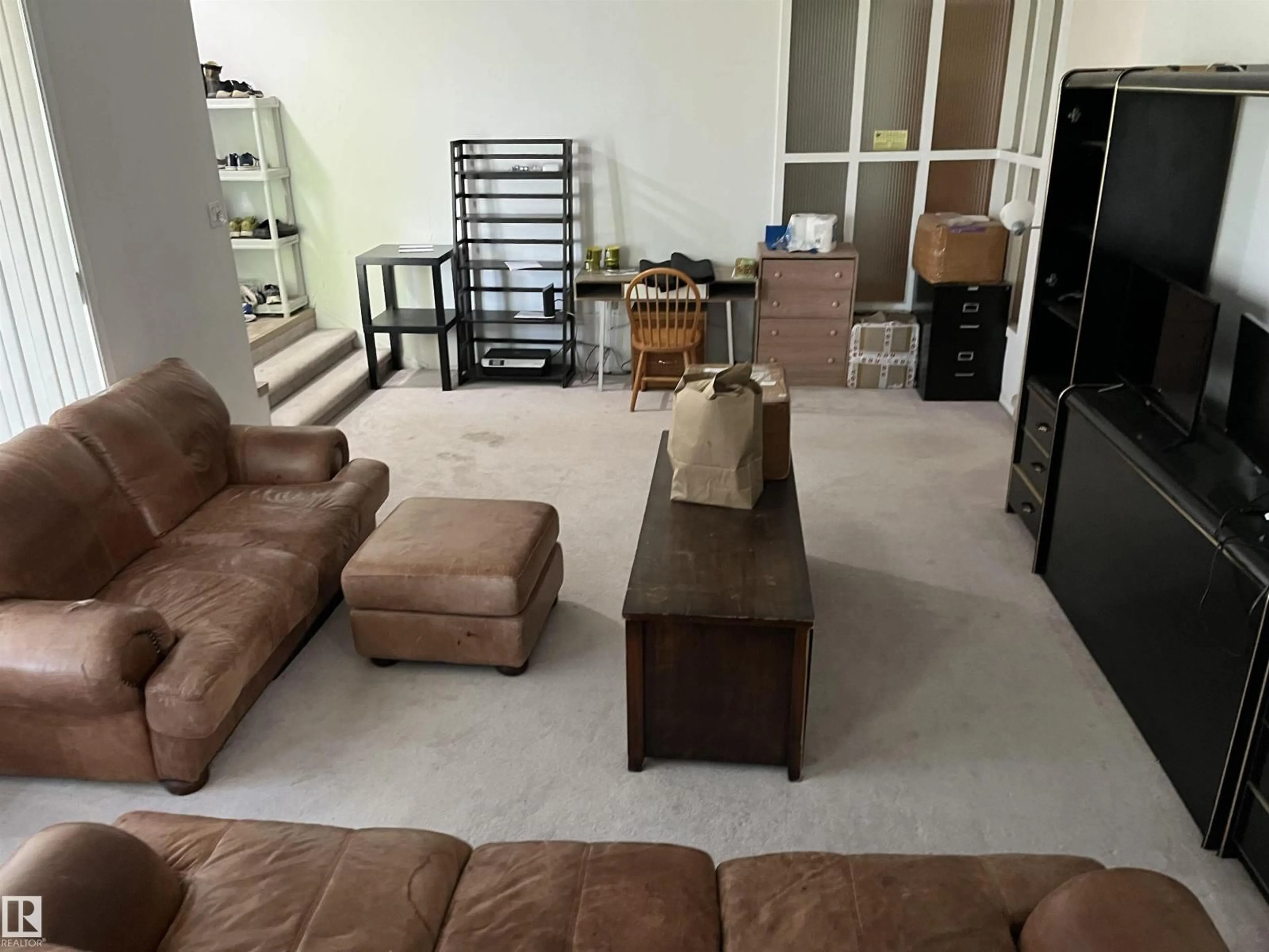 Living room with furniture, unknown for NW - 12011 87 AV, Edmonton Alberta T6G0Y8
