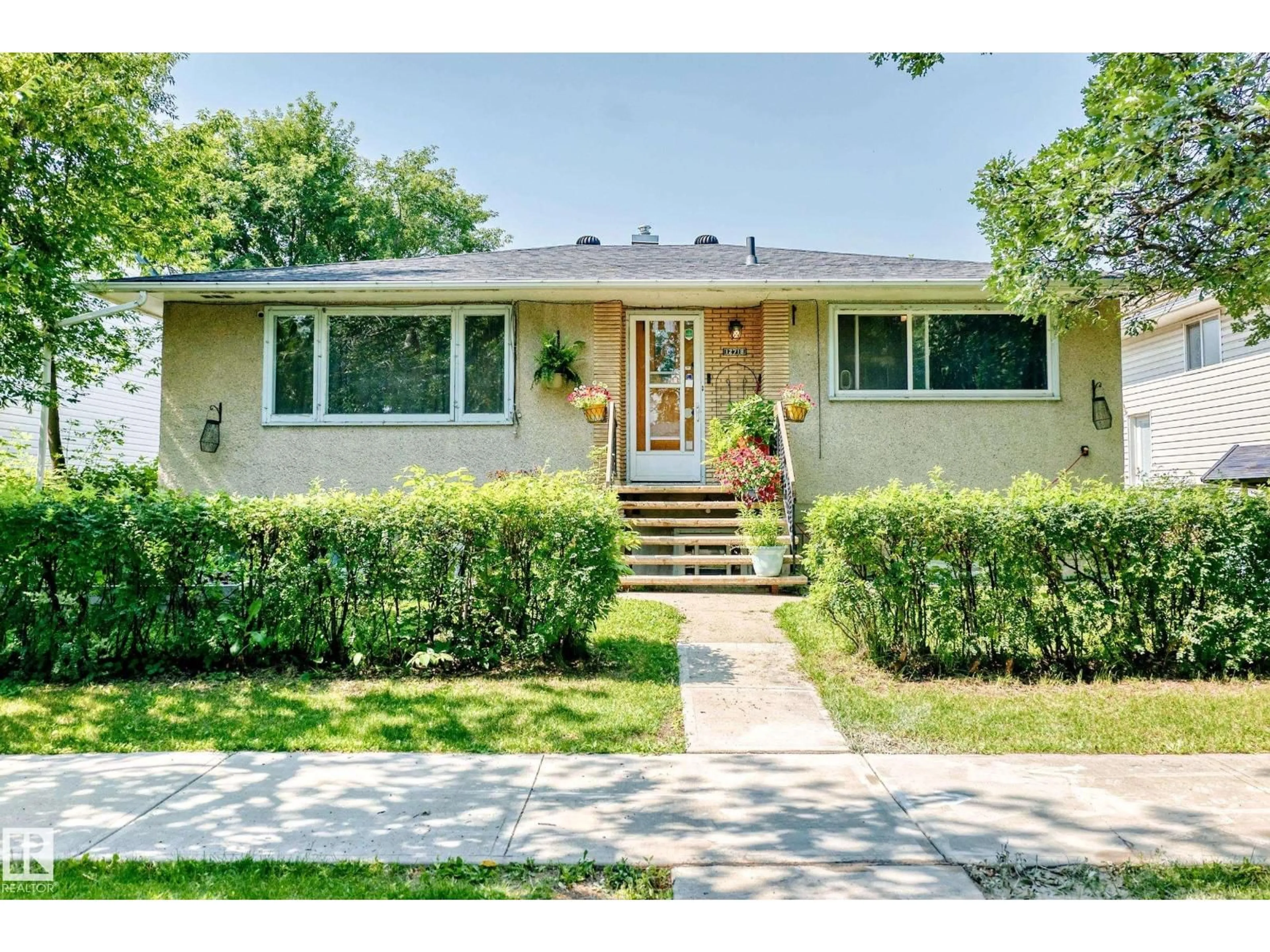 Home with brick exterior material, street for 12718 126 ST, Edmonton Alberta T5L0X8