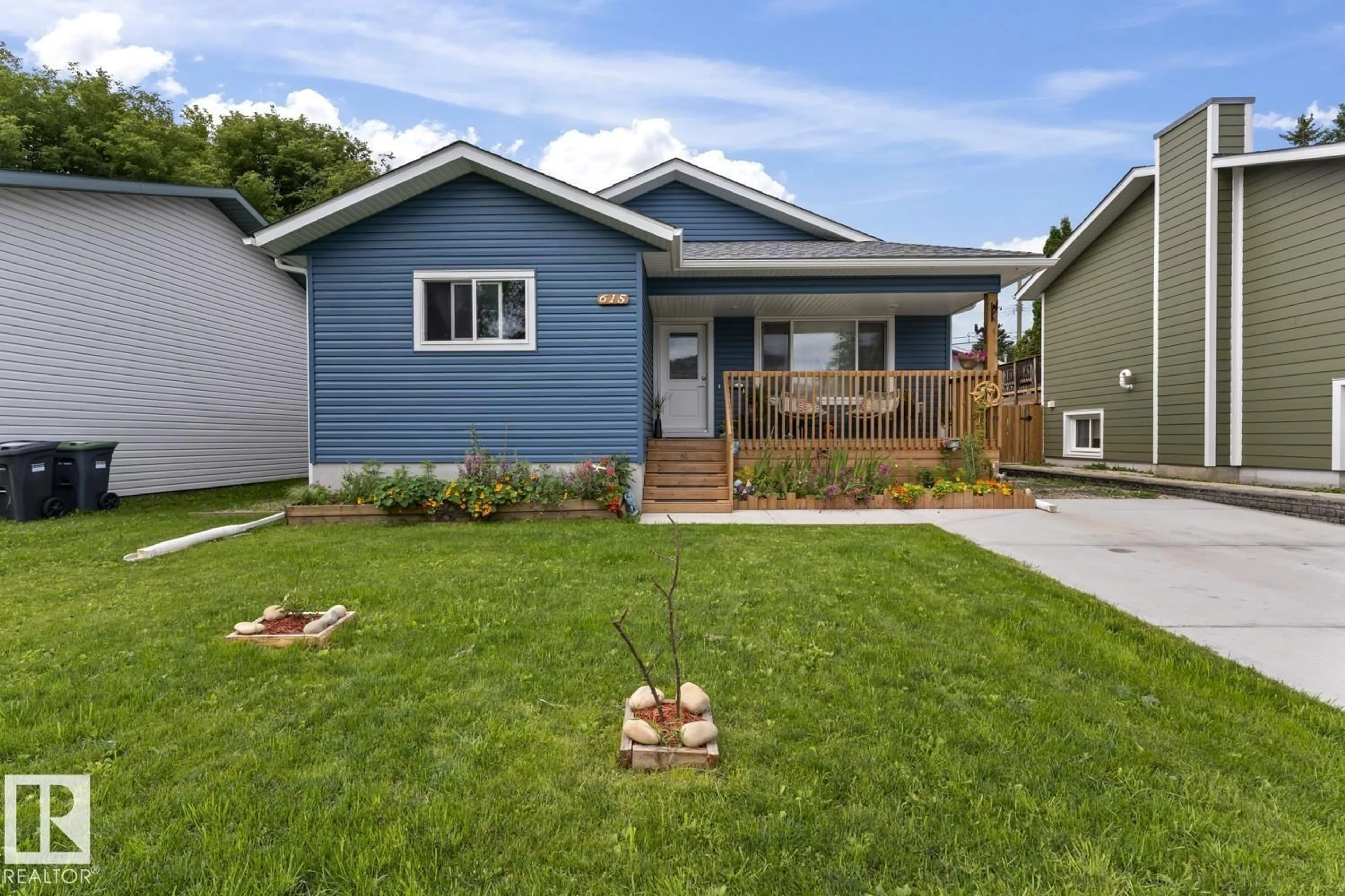 Home with vinyl exterior material, street for 615 10 ST, Cold Lake Alberta T9M1B1