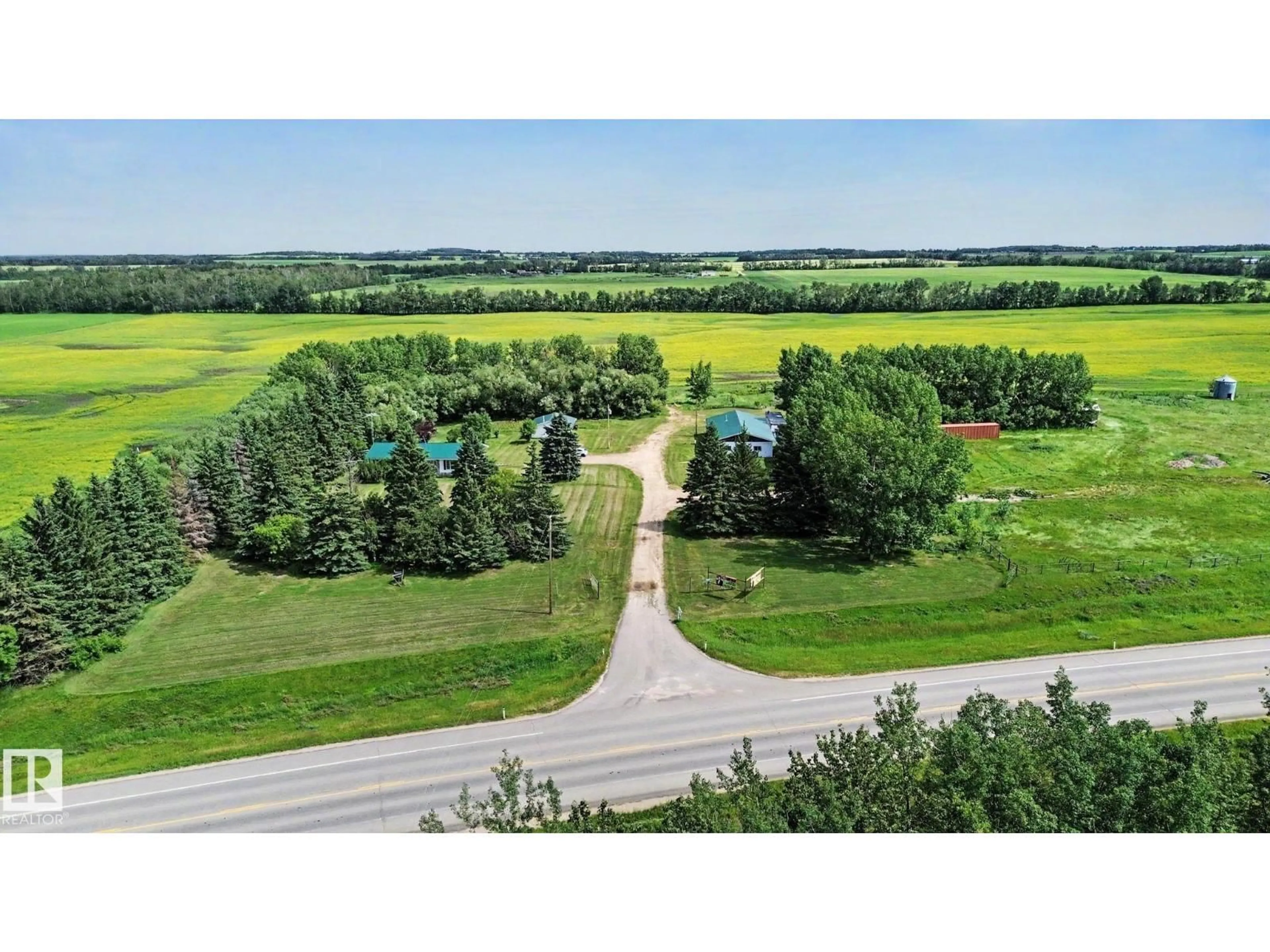A pic from outside/outdoor area/front of a property/back of a property/a pic from drone, forest/trees view for 59227 HIGHWAY 44, Rural Westlock County Alberta T0G1W0