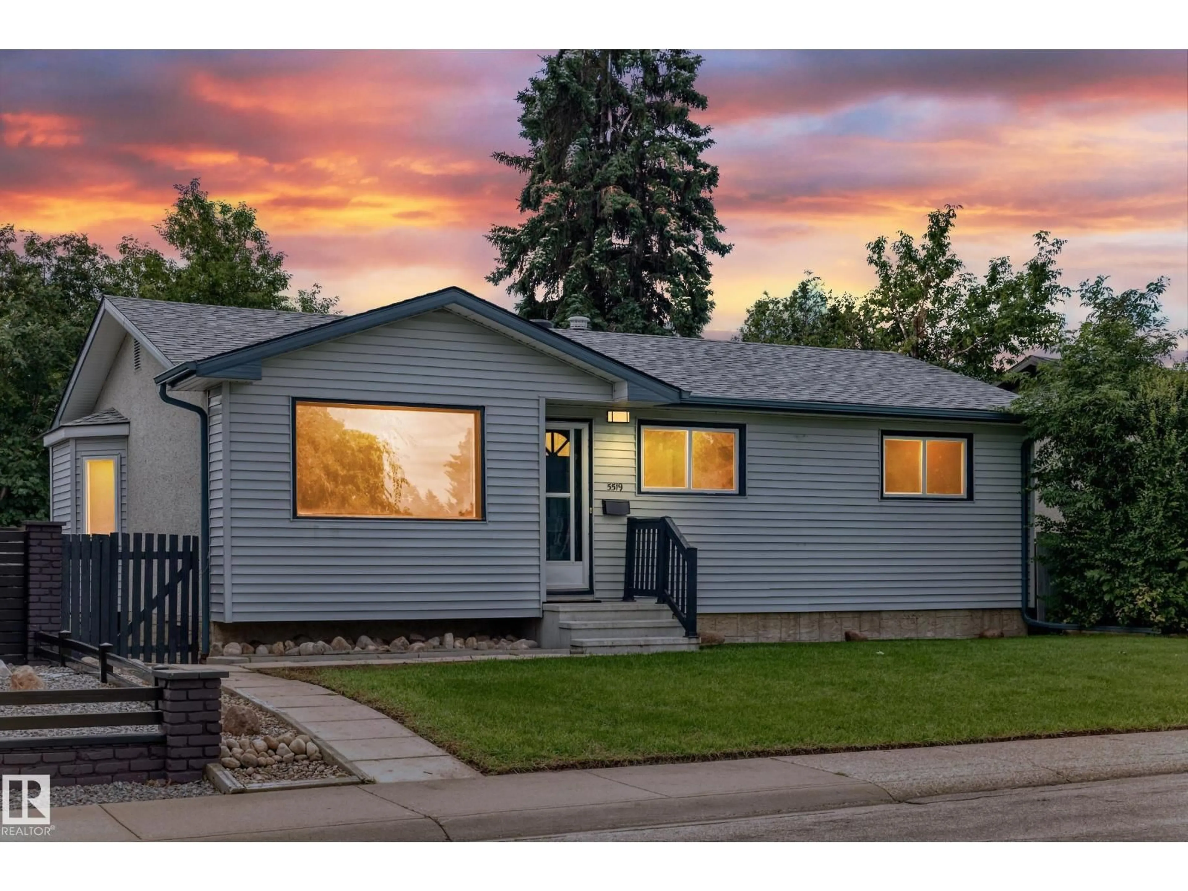 Home with vinyl exterior material, street for 5519 142 AV, Edmonton Alberta T5A1J1