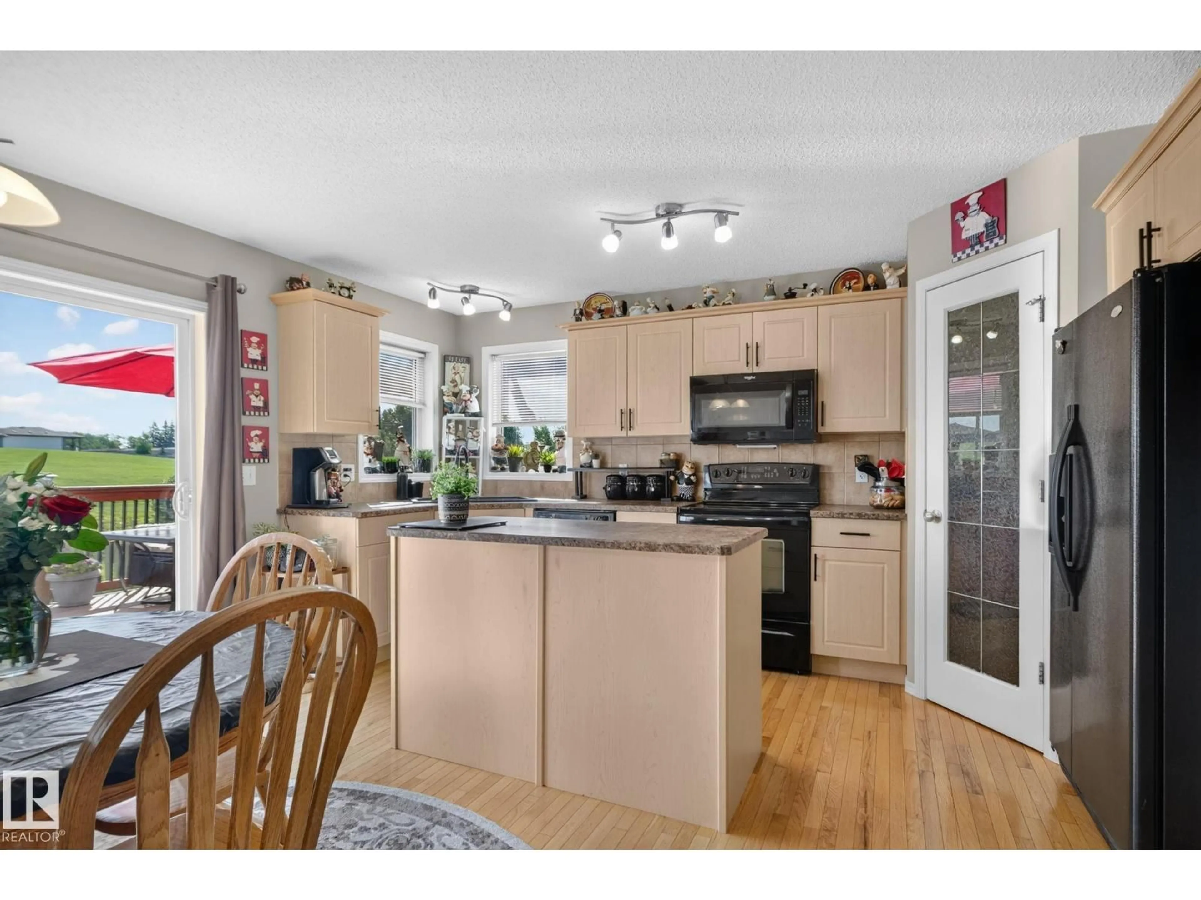 Open concept kitchen, wood/laminate floor for 226 BROOKVIEW WY, Stony Plain Alberta T7Z2X7
