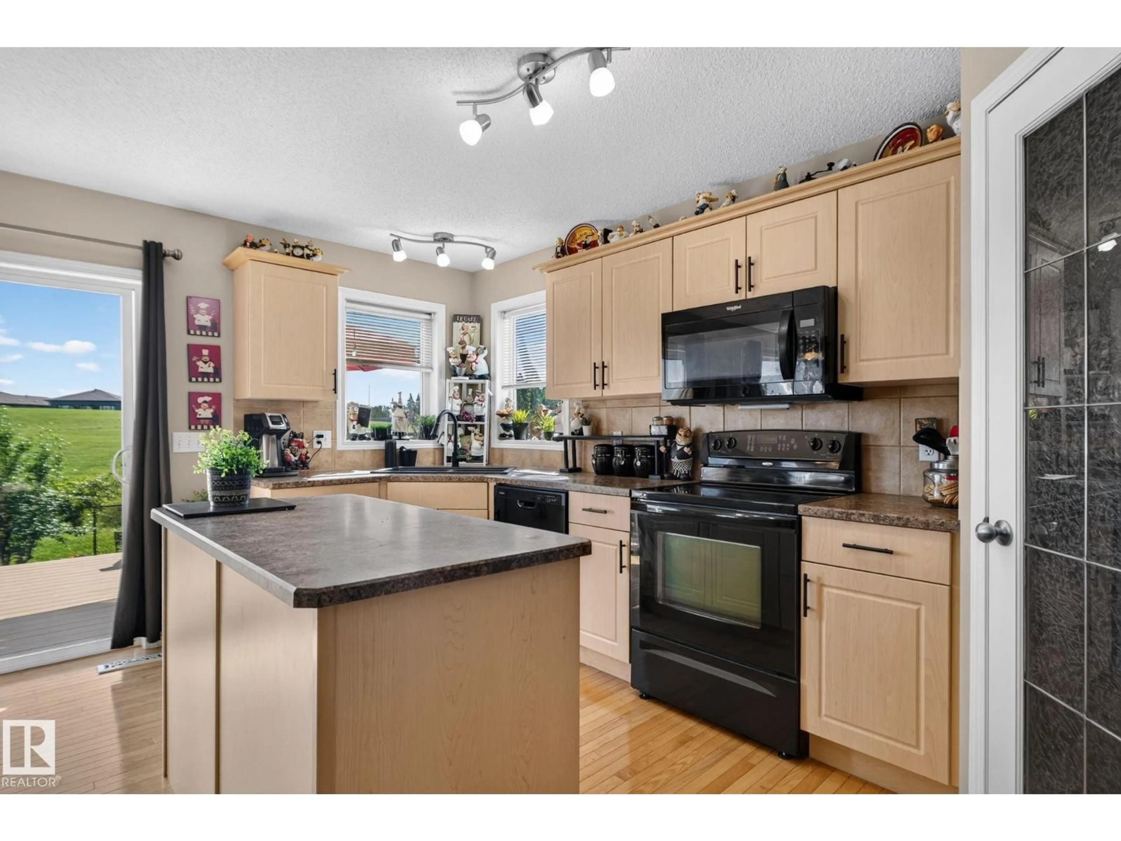 Open concept kitchen, wood/laminate floor for 226 BROOKVIEW WY, Stony Plain Alberta T7Z2X7