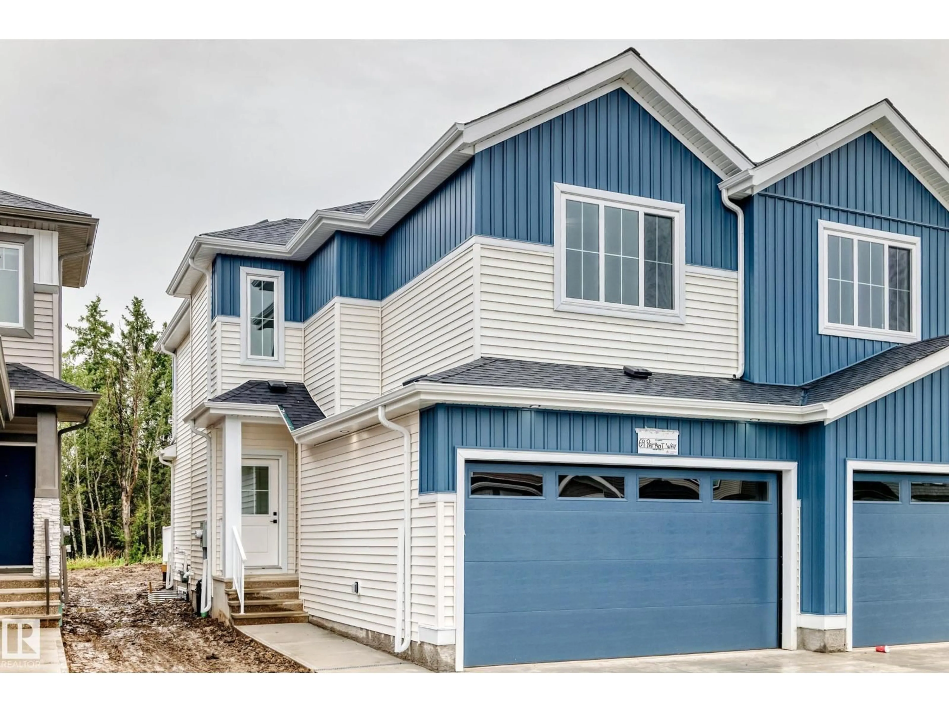 Home with vinyl exterior material, street for 69 PATRIOT WY, Spruce Grove Alberta T7X4E8