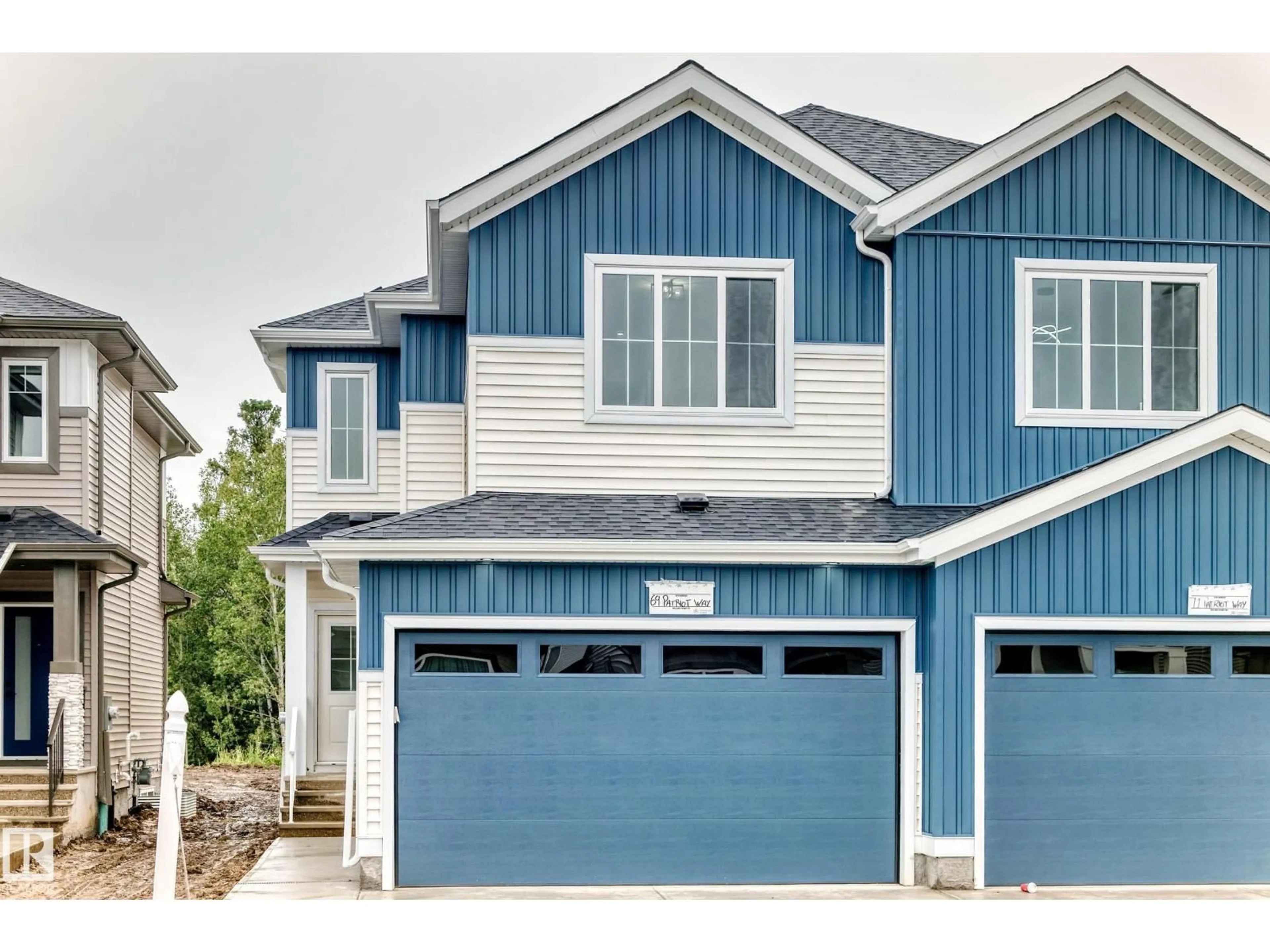 Home with vinyl exterior material, street for 69 PATRIOT WY, Spruce Grove Alberta T7X4E8