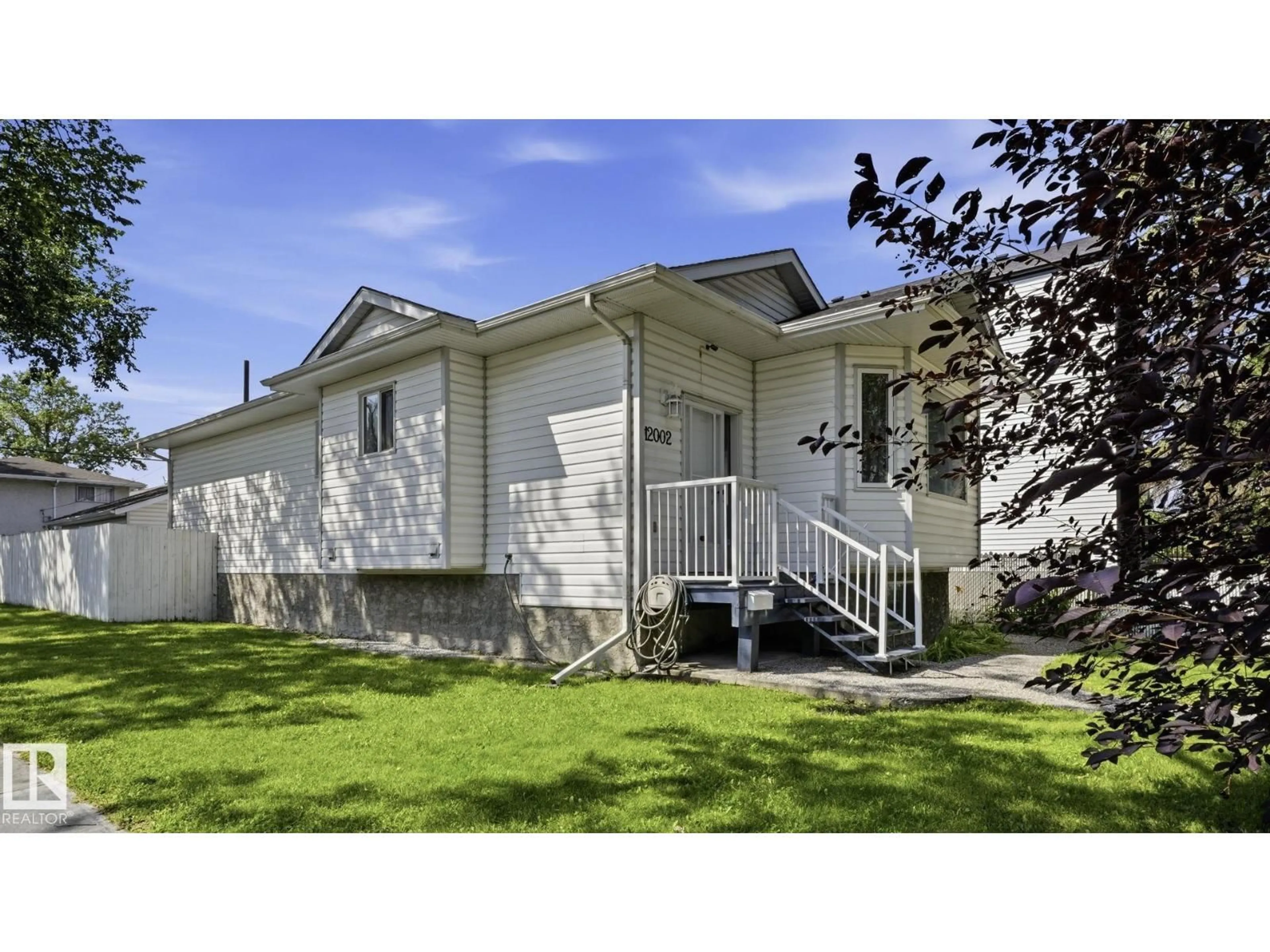 Home with vinyl exterior material, street for NW - 12002 91 ST, Edmonton Alberta T5B4B8