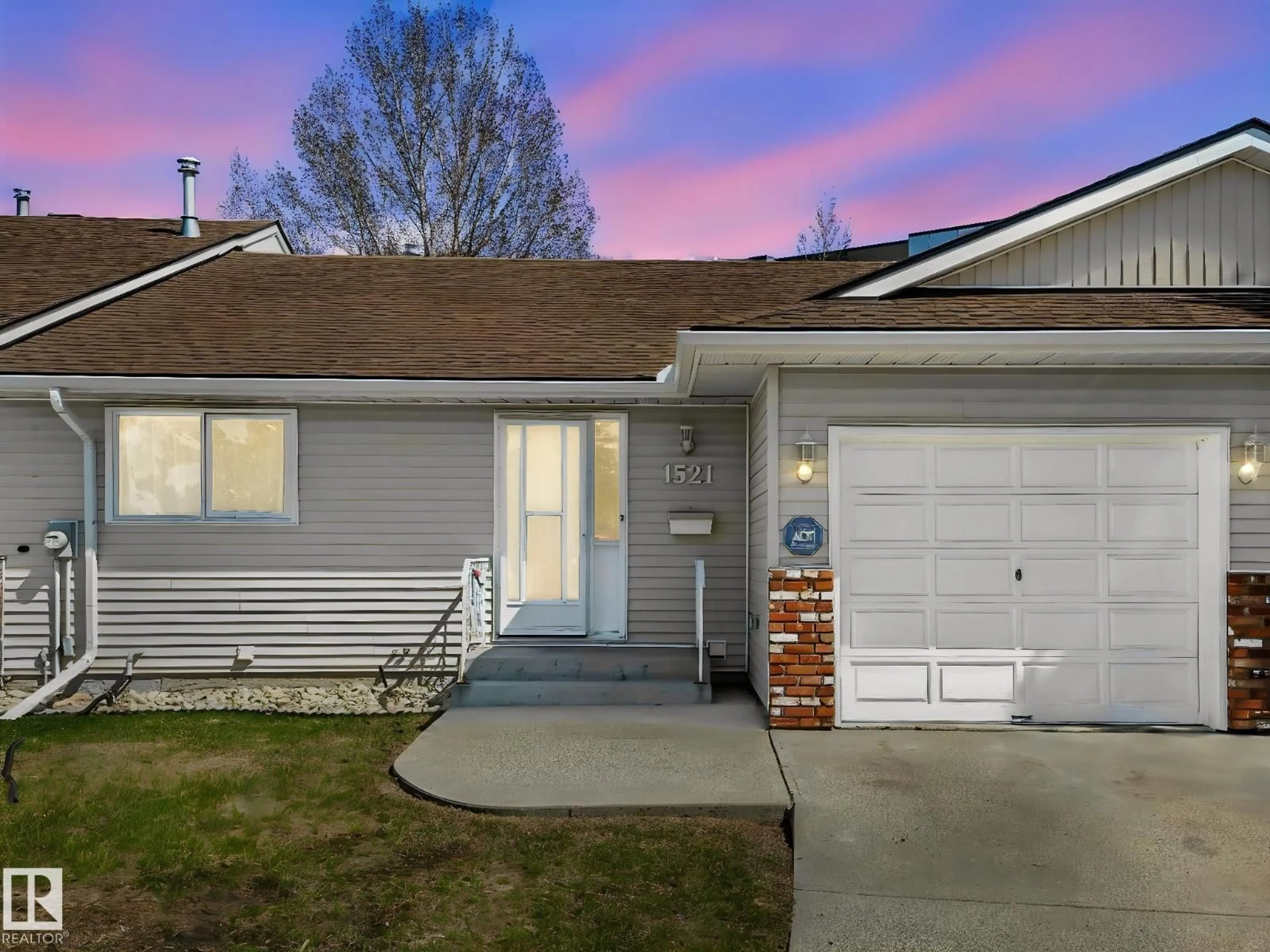 Home with vinyl exterior material, street for 1521 62 ST, Edmonton Alberta T6L6J4