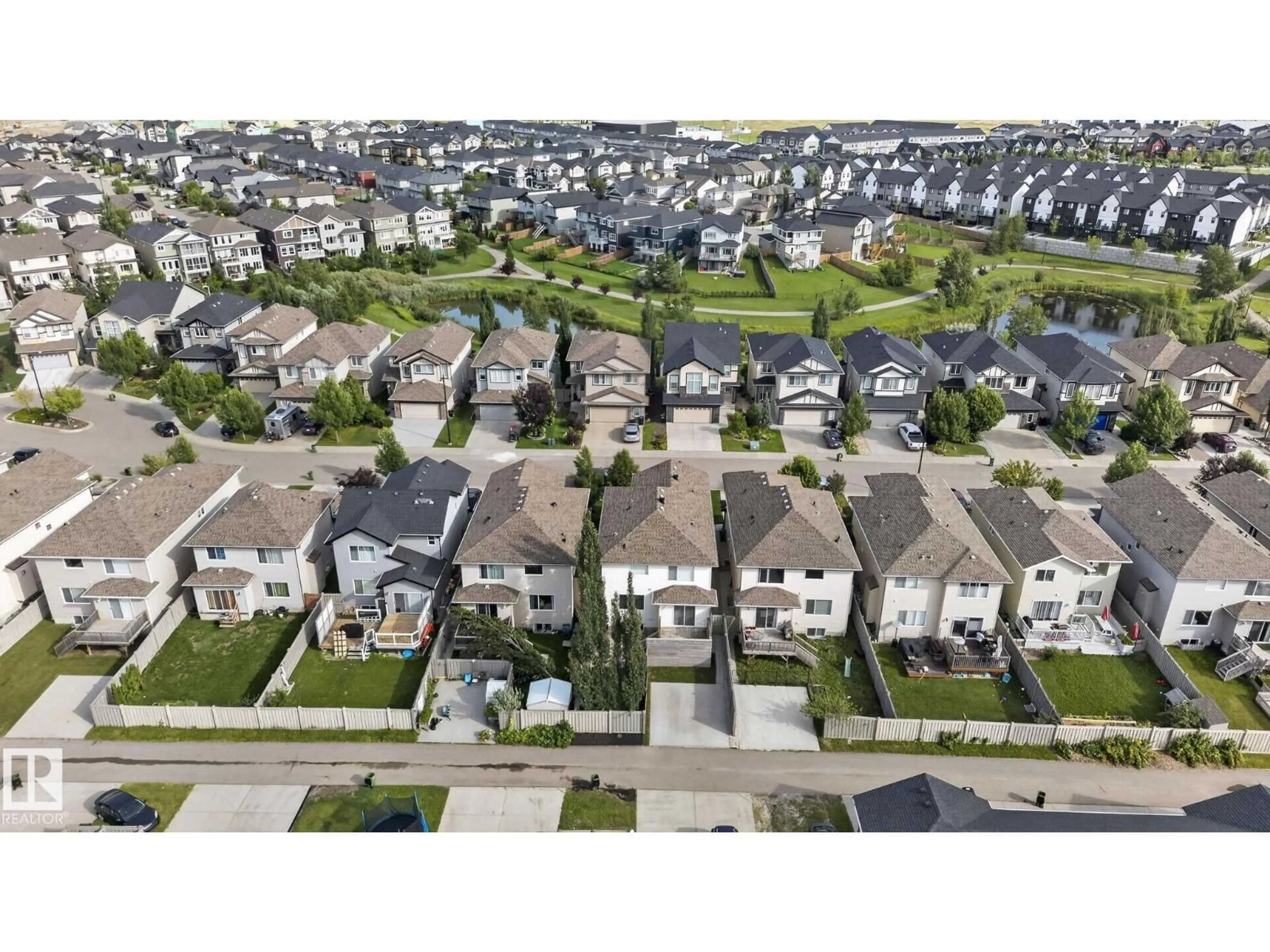 A pic from outside/outdoor area/front of a property/back of a property/a pic from drone, street for 3536 CLAXTON CR, Edmonton Alberta T6W0Z6