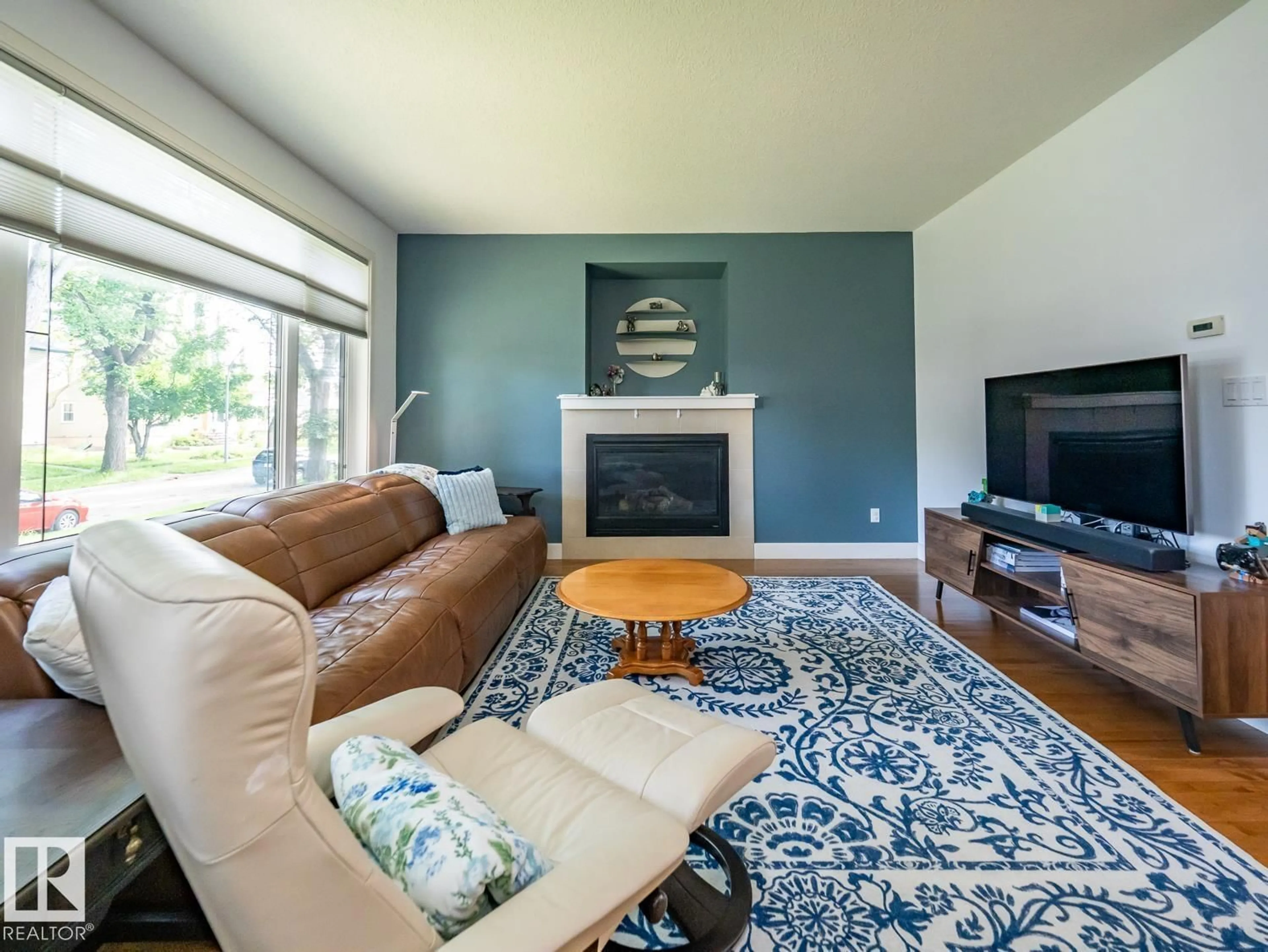 Living room with furniture, unknown for 10957 75 AV, Edmonton Alberta T6G0G8