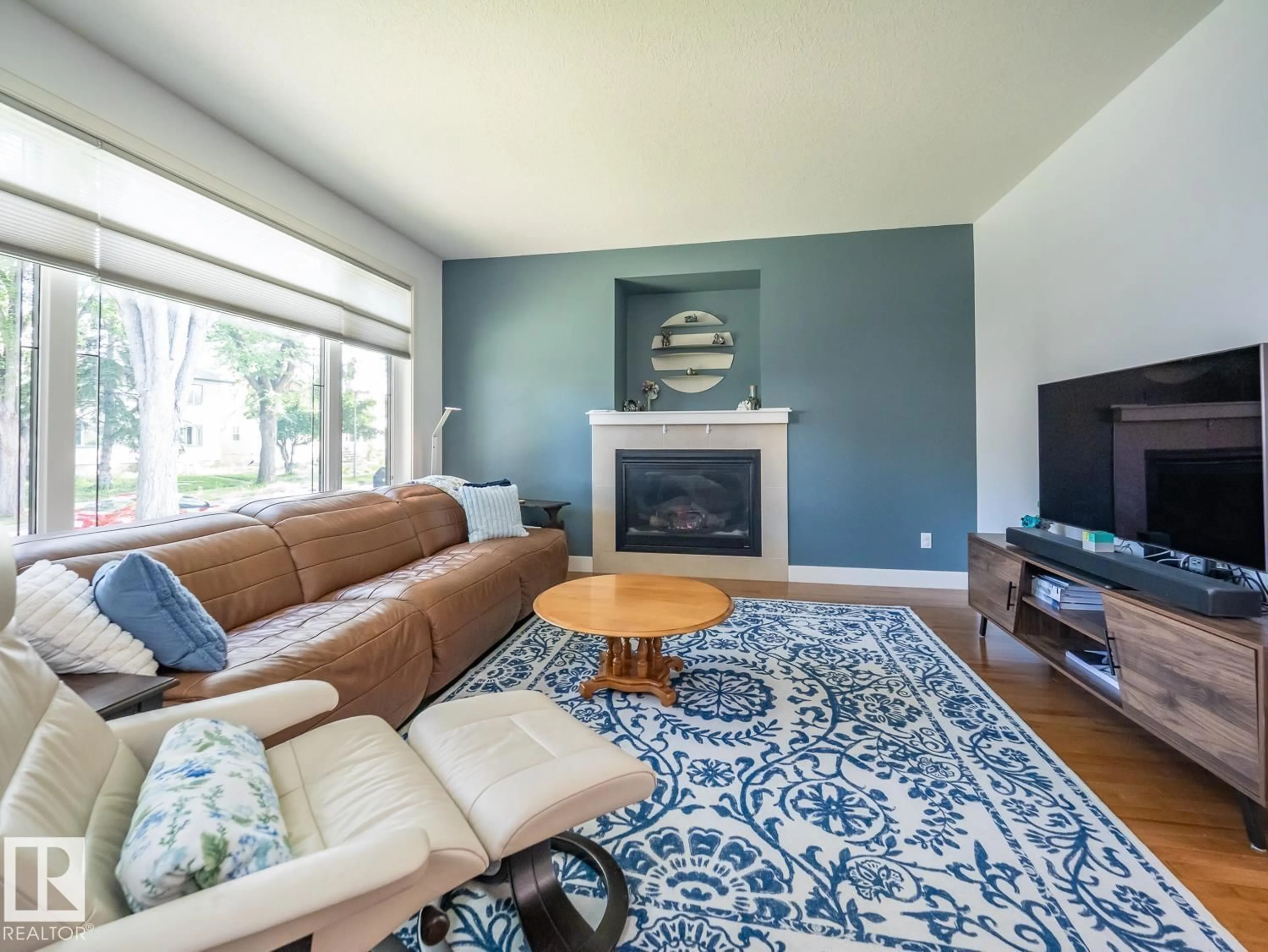 Living room with furniture, unknown for 10957 75 AV, Edmonton Alberta T6G0G8