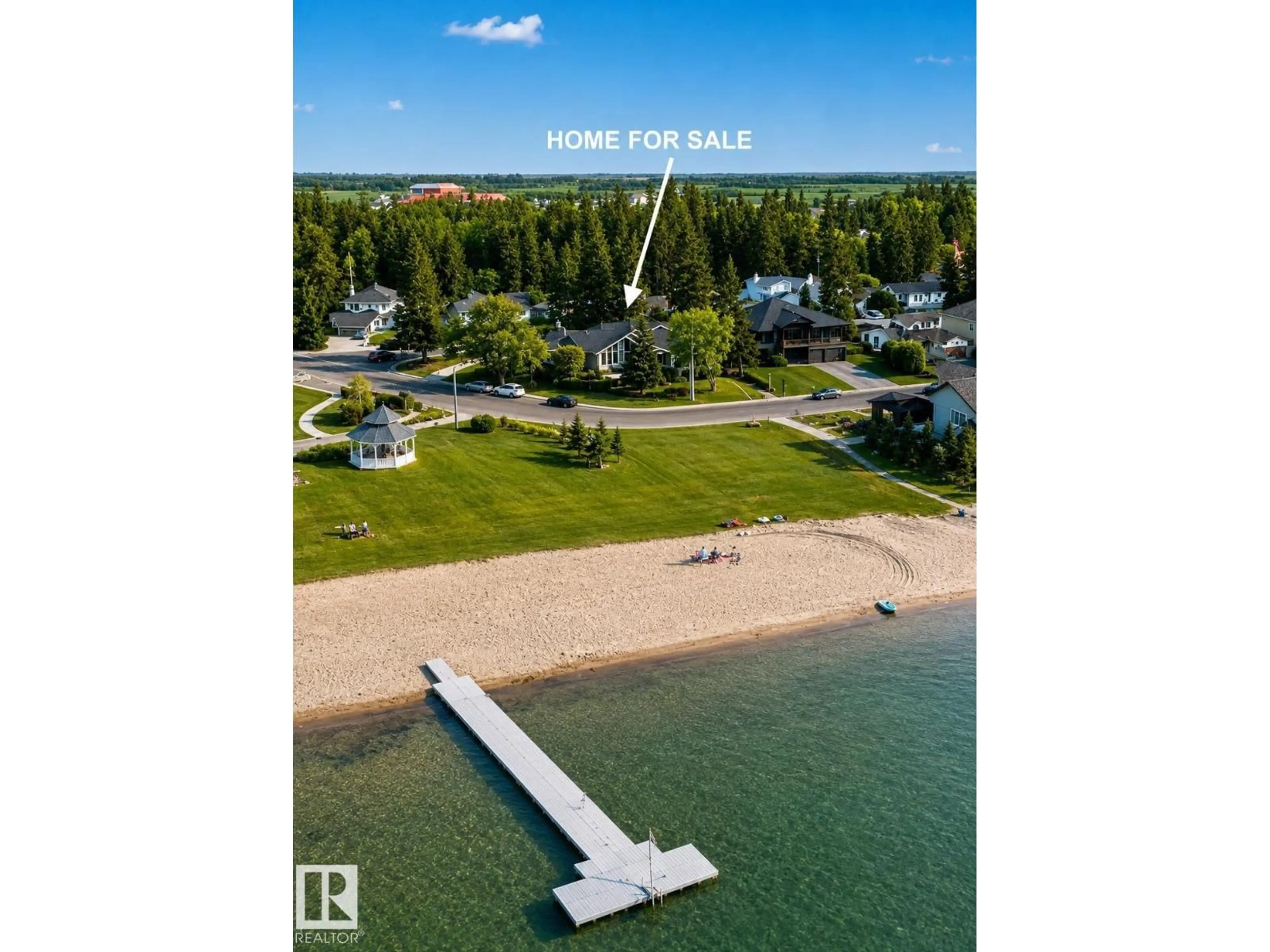 A pic from outside/outdoor area/front of a property/back of a property/a pic from drone, water/lake/river/ocean view for 203 PINE AV, Cold Lake Alberta T9M1E5