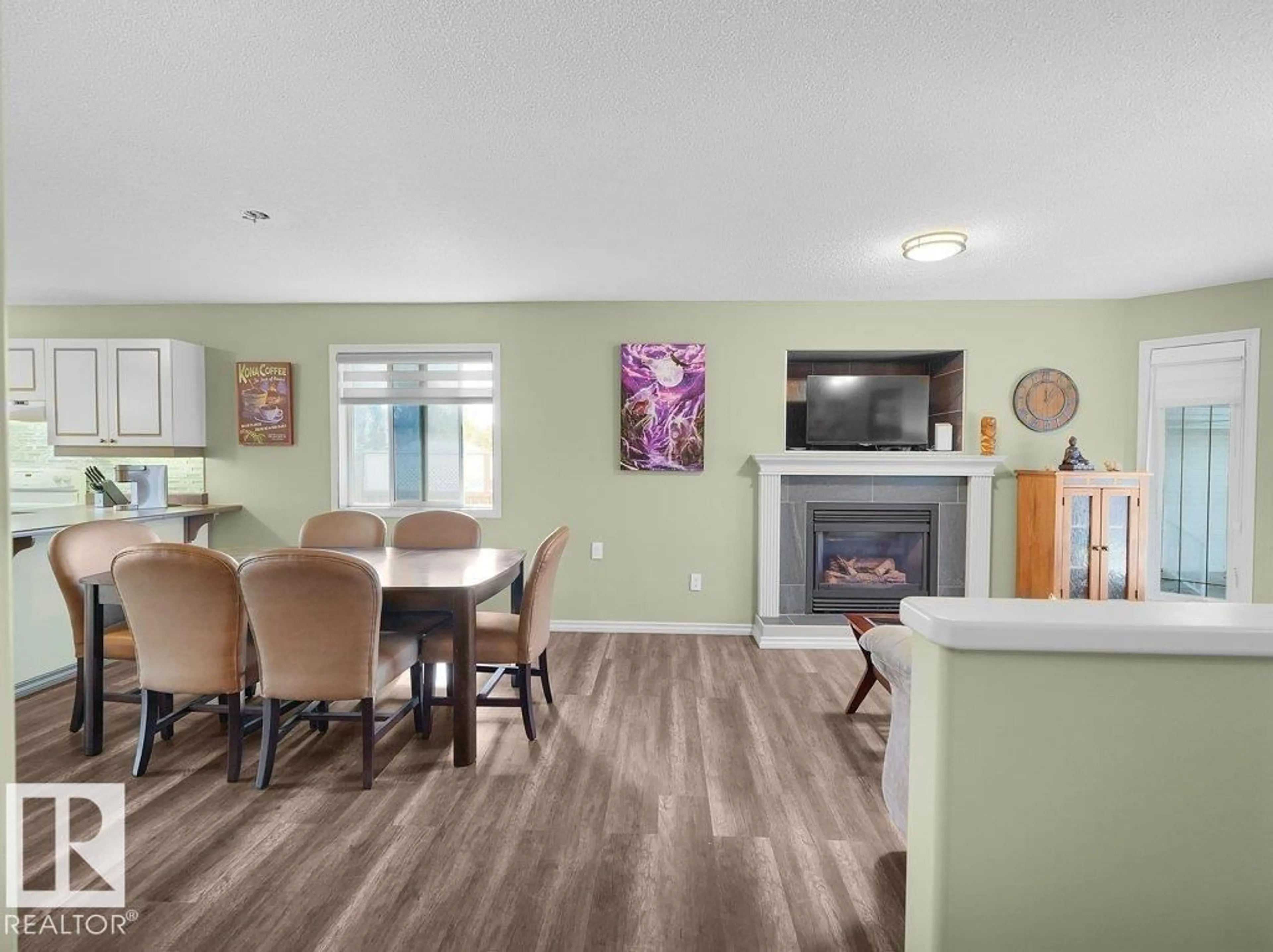 Living room with furniture, wood/laminate floor for 204 WESTMEWS DR, Fort Saskatchewan Alberta T8L4J2