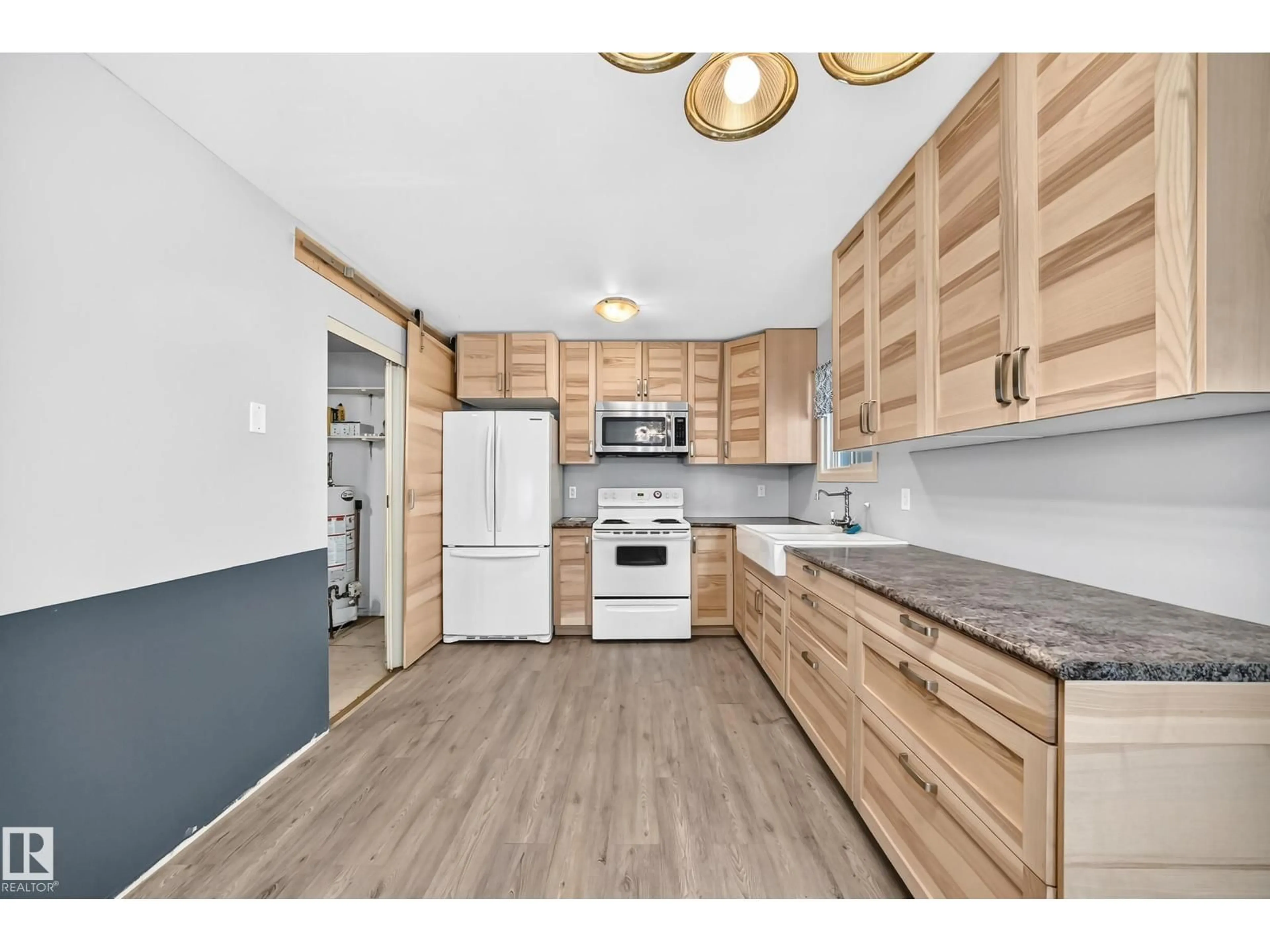 Open concept kitchen, wood/laminate floor for NW - 290 LANCASTER TC, Edmonton Alberta T5X5T7
