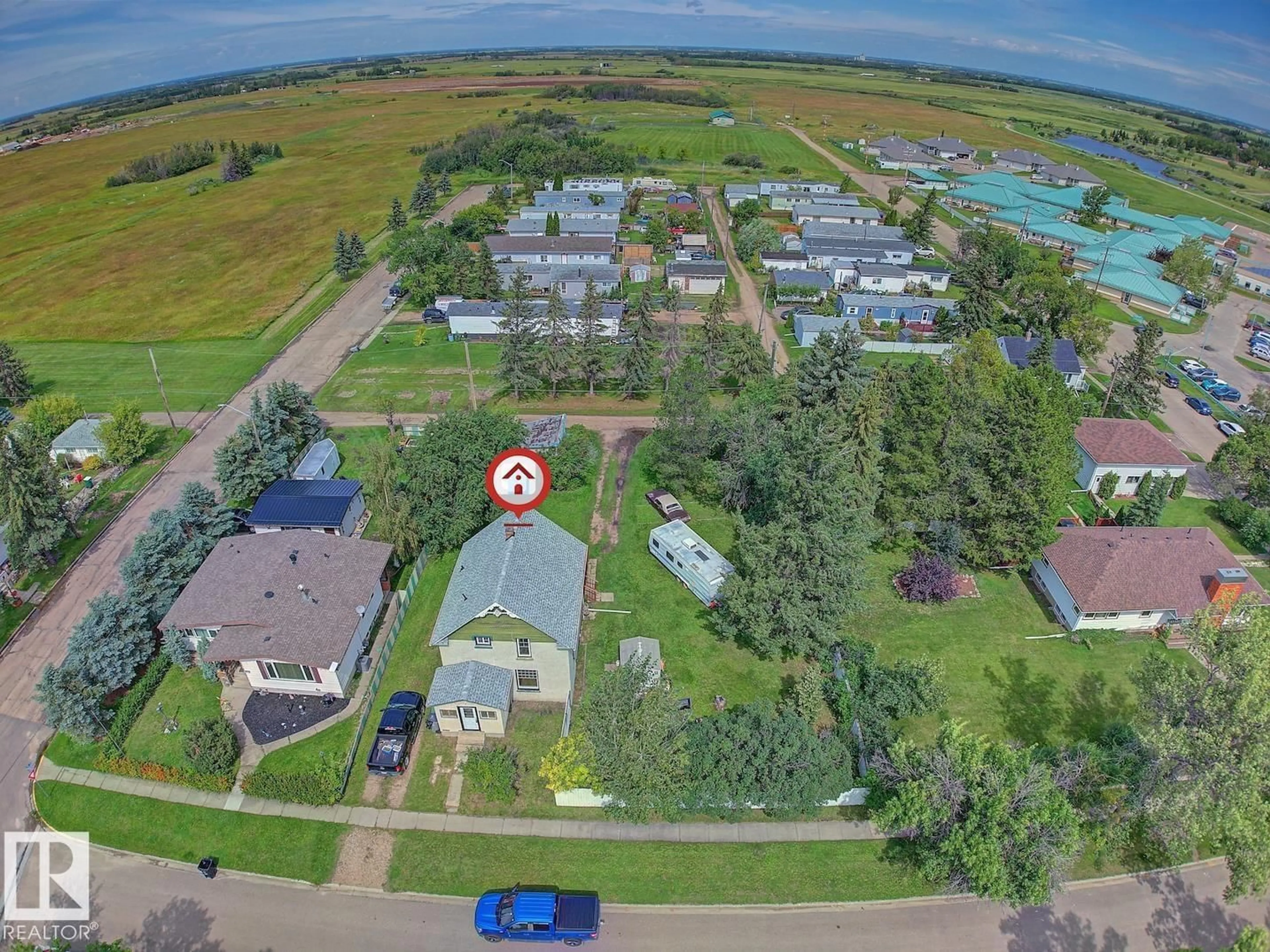 A pic from outside/outdoor area/front of a property/back of a property/a pic from drone, water/lake/river/ocean view for 5414 52 AV, Lamont Alberta T0B2R0