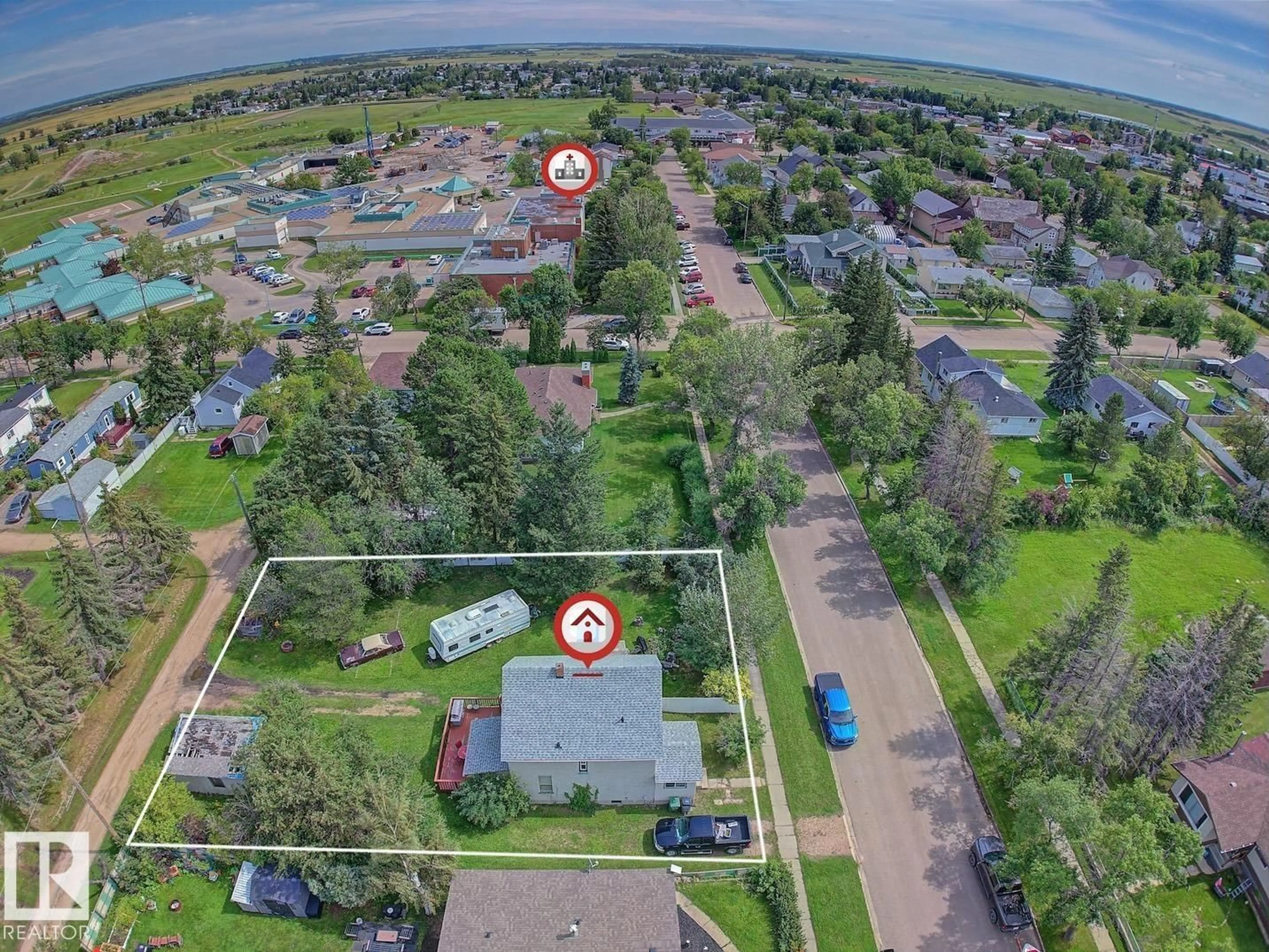 A pic from outside/outdoor area/front of a property/back of a property/a pic from drone, street for 5414 52 AV, Lamont Alberta T0B2R0