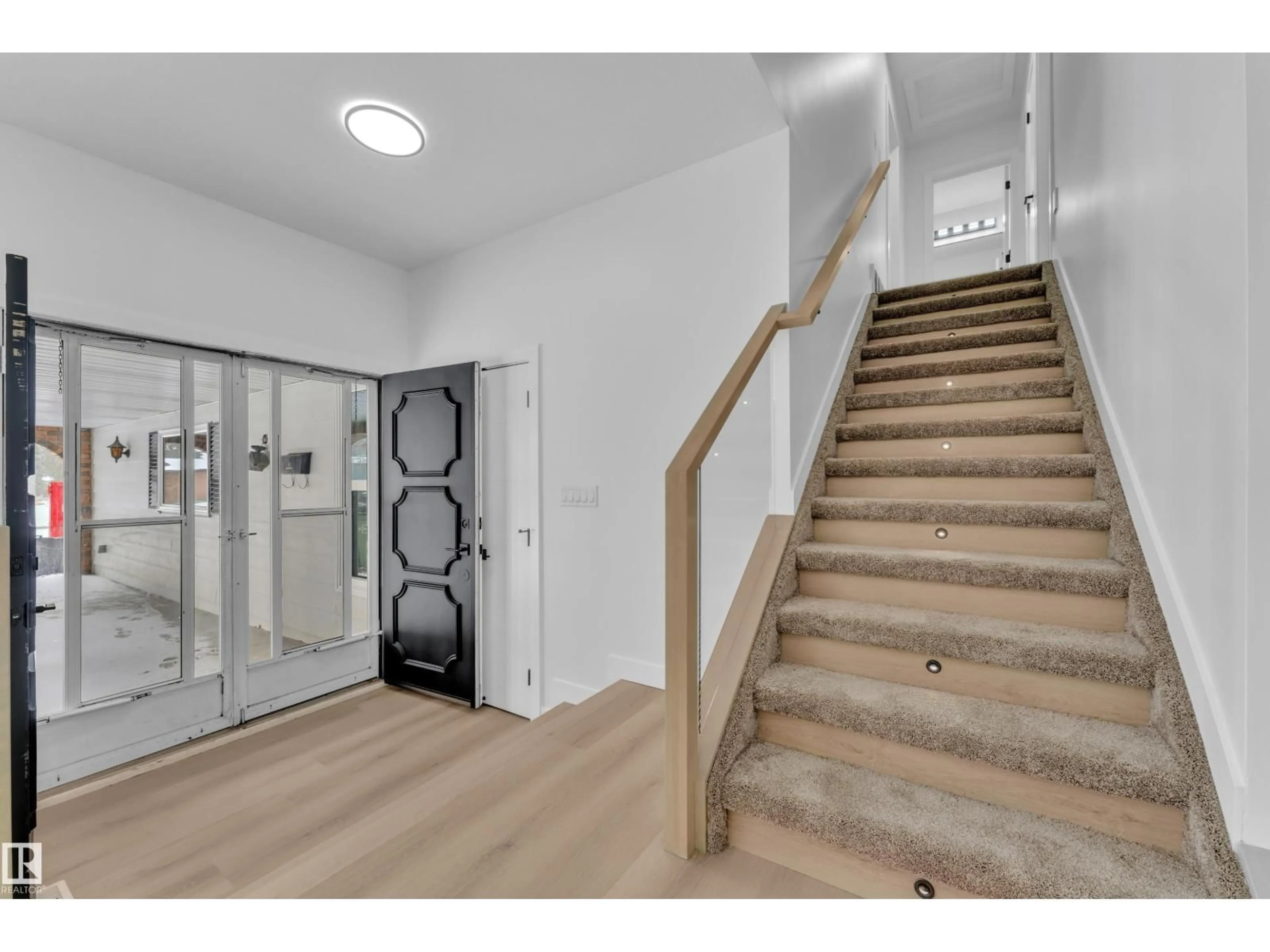 Indoor foyer for NW - 11615 24 AV, Edmonton Alberta T6J3R6