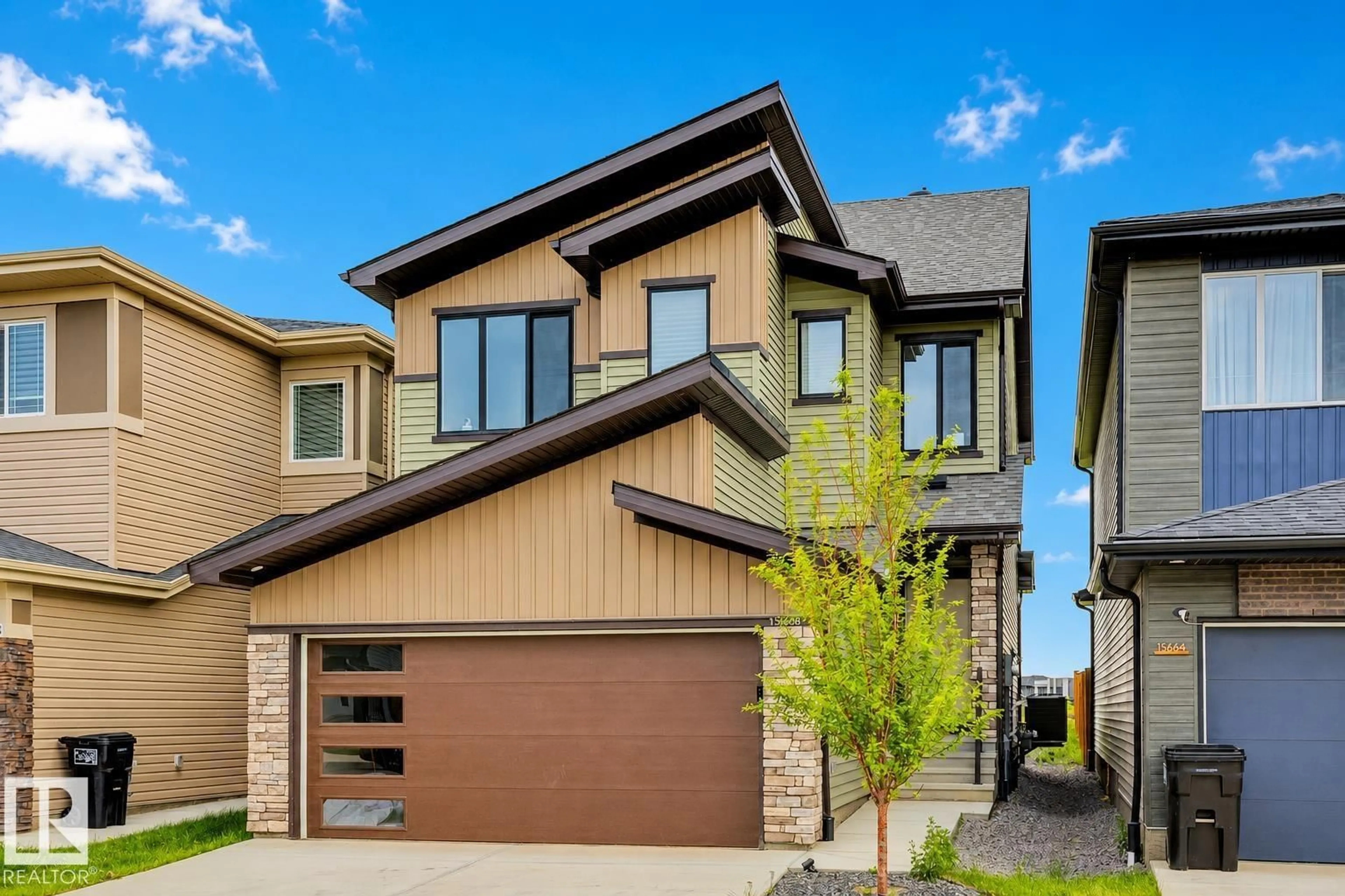 Home with brick exterior material, street for SW - 15666 18 AV, Edmonton Alberta T6W5C2