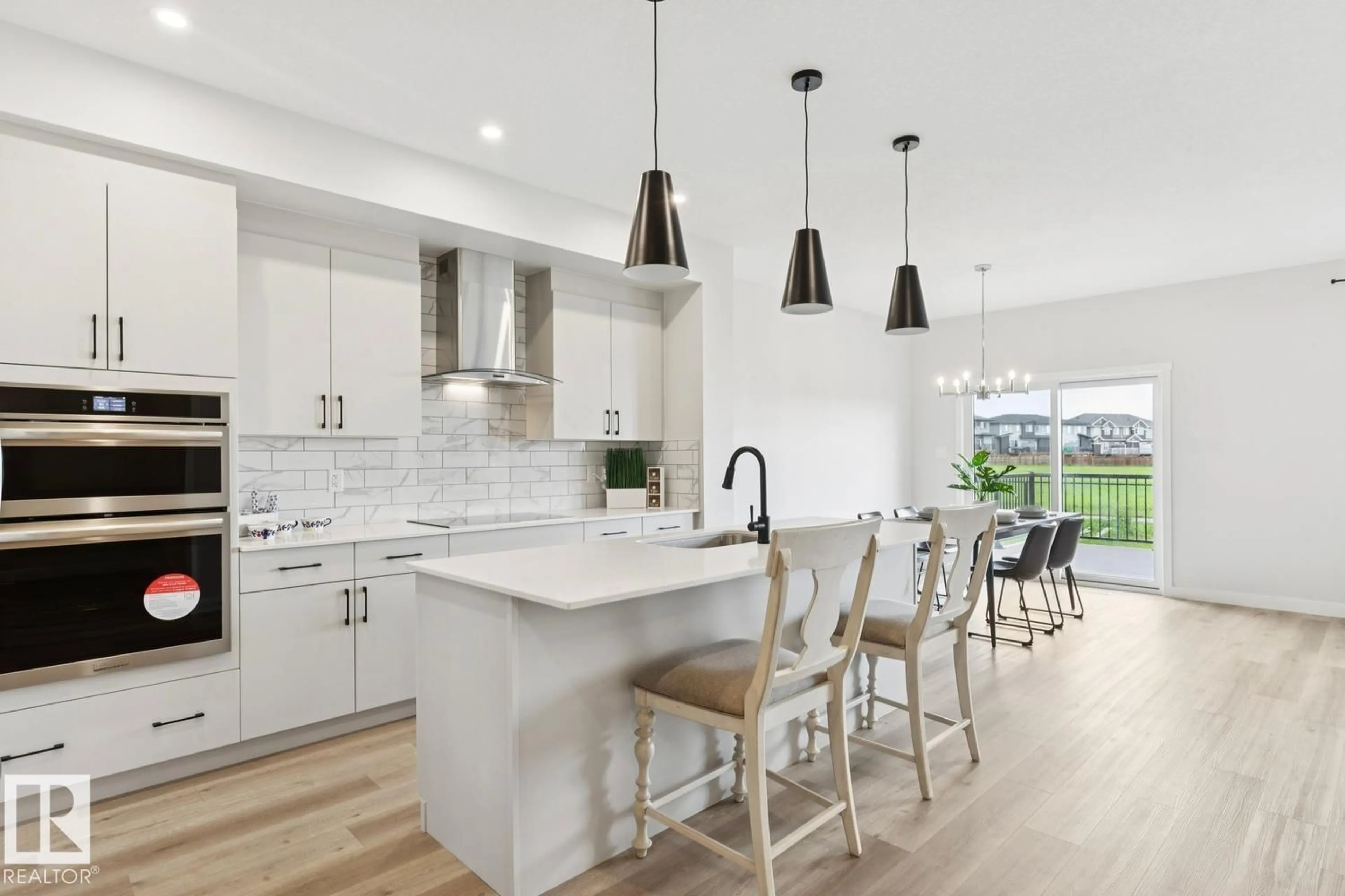 Open concept kitchen, ceramic/tile floor for SW - 15666 18 AV, Edmonton Alberta T6W5C2