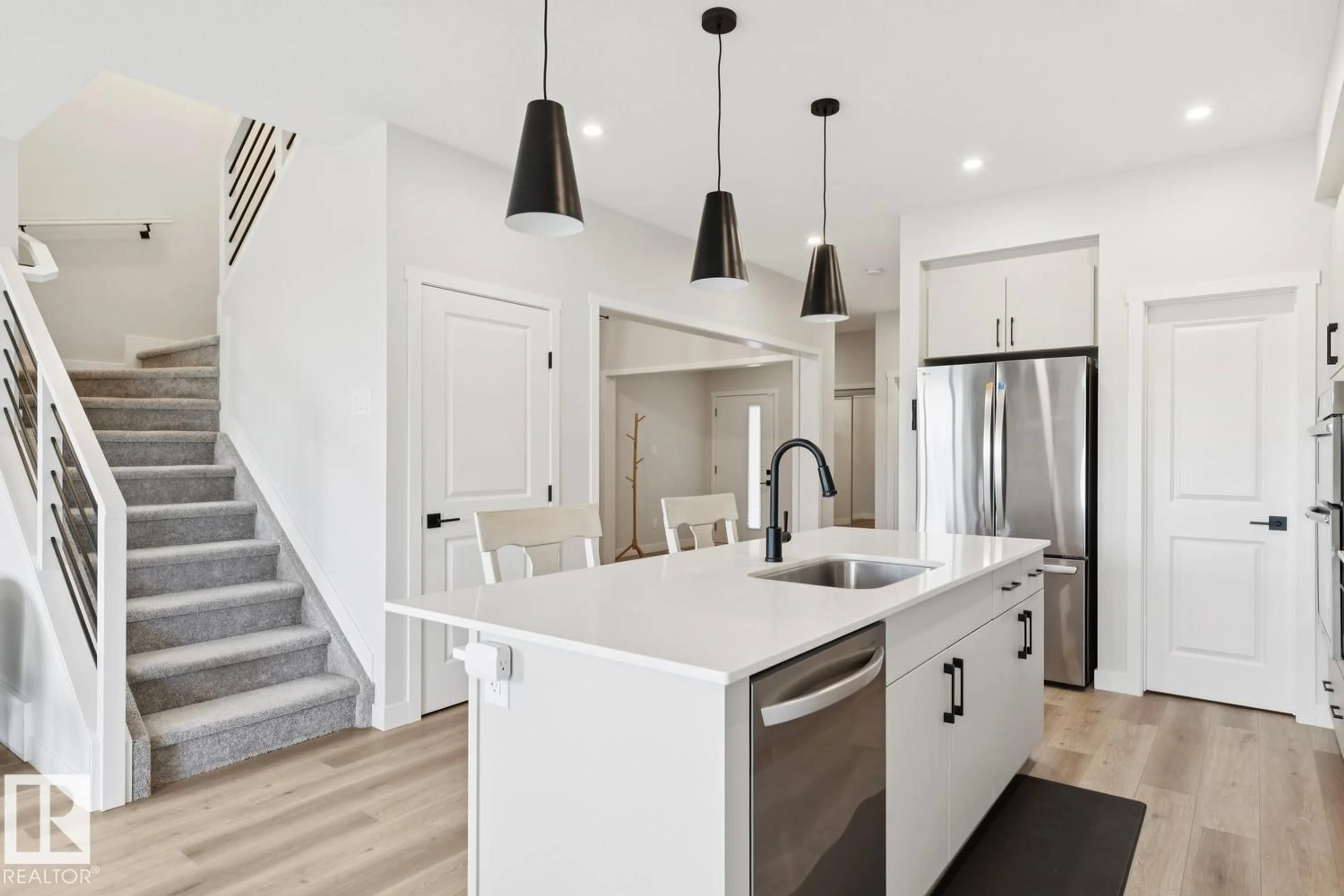 Open concept kitchen, unknown for SW - 15666 18 AV, Edmonton Alberta T6W5C2