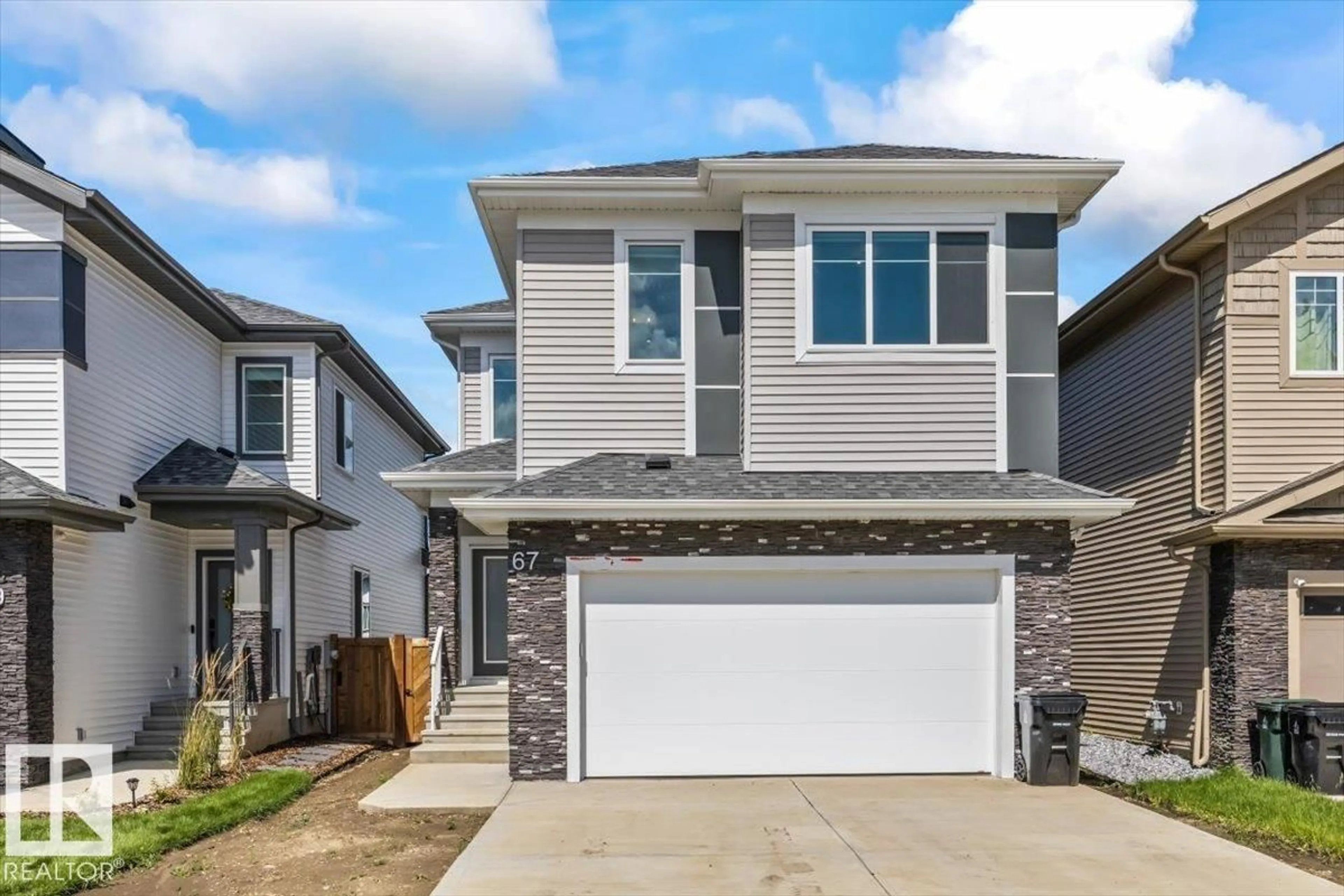 Home with vinyl exterior material, street for 67 MEADOWGROVE LN, Spruce Grove Alberta T7X0W2