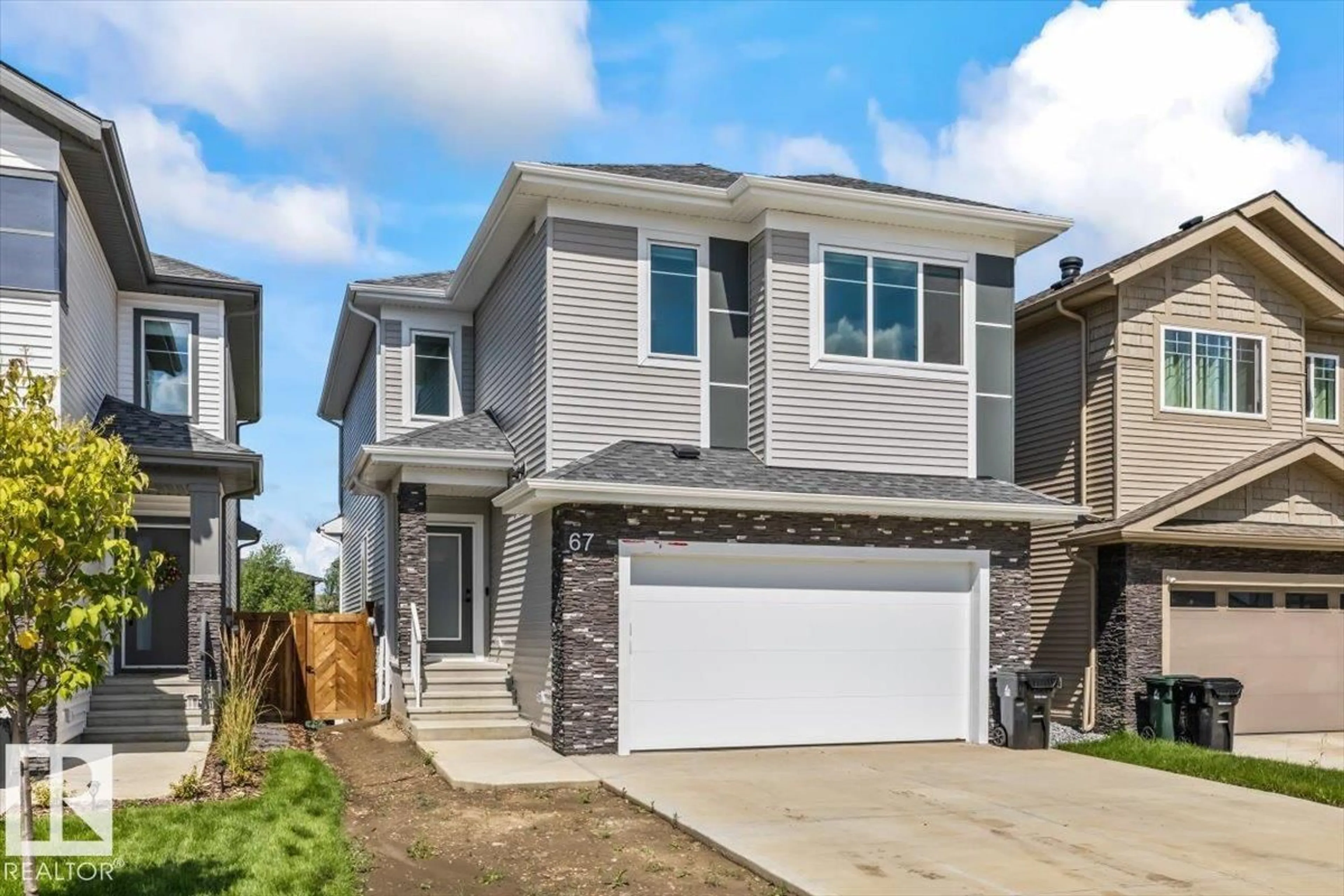 Home with vinyl exterior material, street for 67 MEADOWGROVE LN, Spruce Grove Alberta T7X0W2