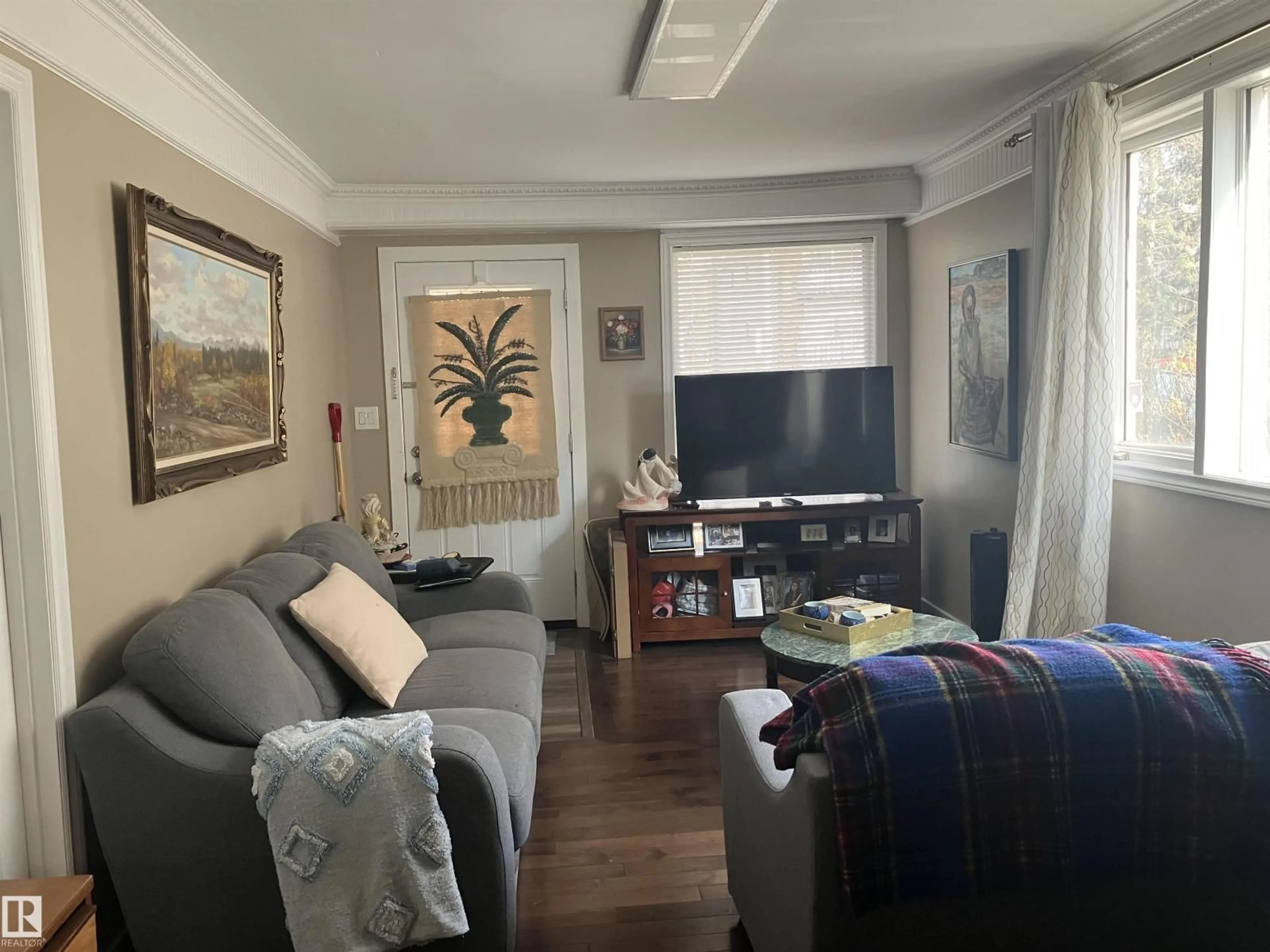 Living room with furniture, unknown for 11724 88 ST, Edmonton Alberta T5B3R7