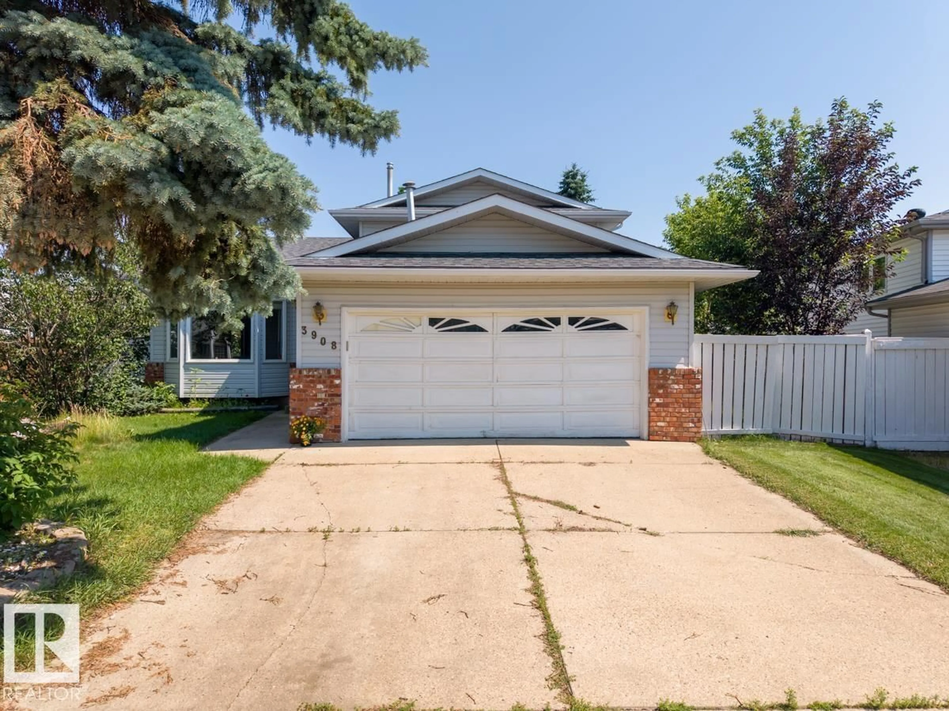 Home with vinyl exterior material, street for 3908 28 AV, Edmonton Alberta T6L6E4