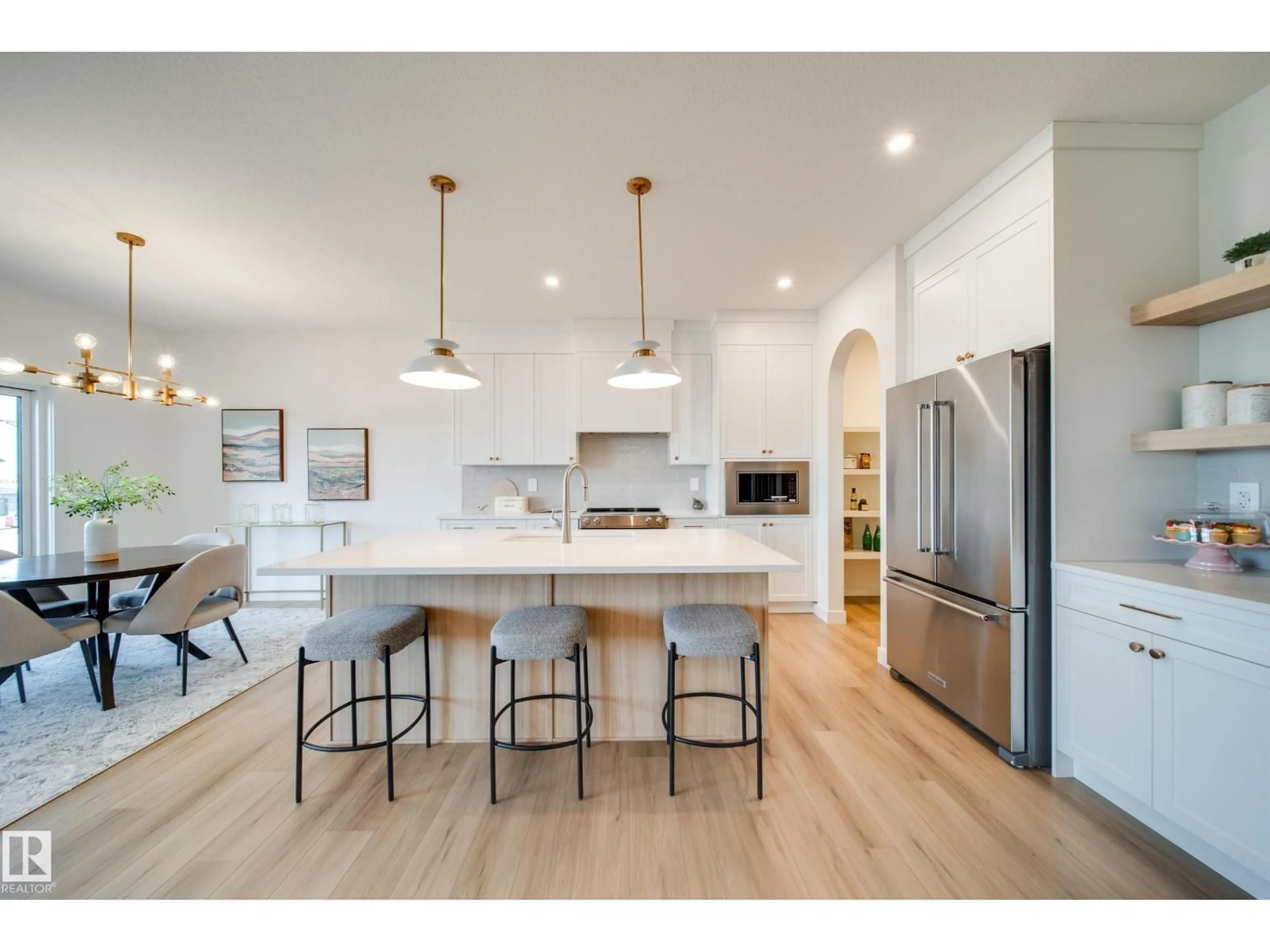 Open concept kitchen, wood/laminate floor for 54 CLICHY CL, St. Albert Alberta T8T2E3