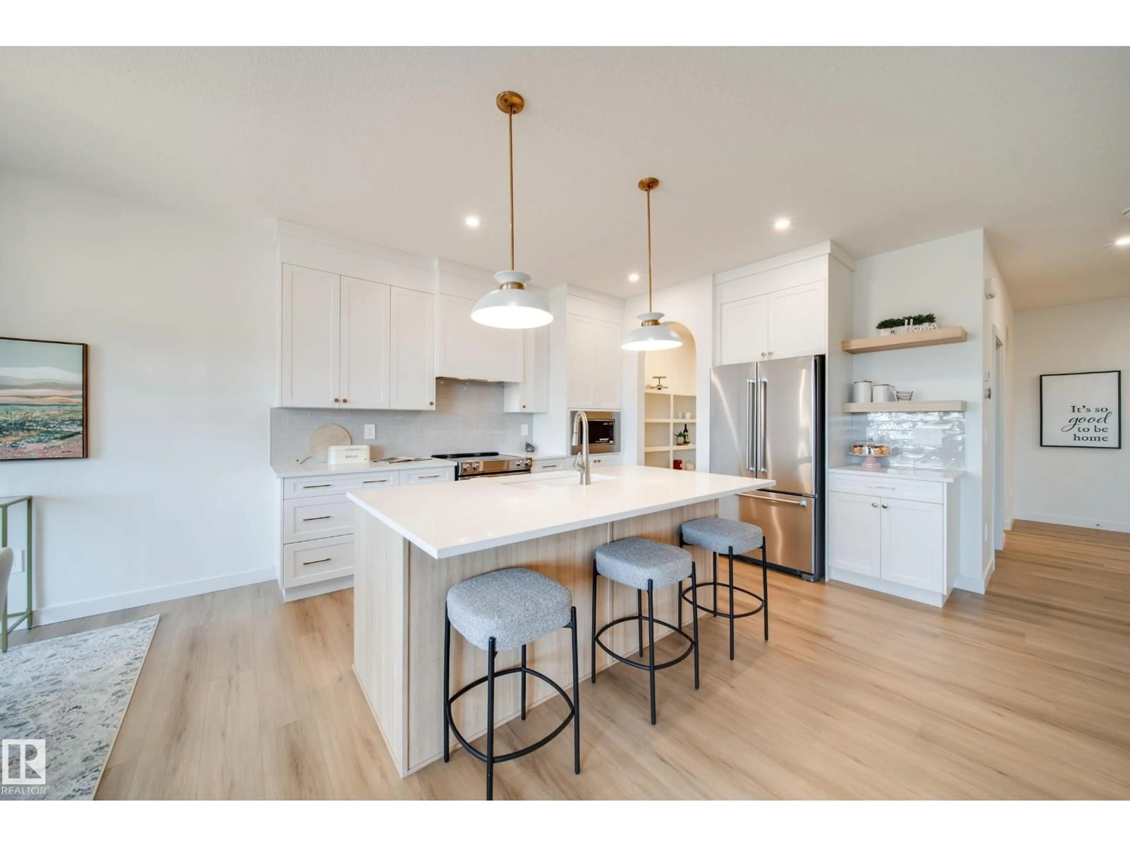 Open concept kitchen, wood/laminate floor for 54 CLICHY CL, St. Albert Alberta T8T2E3