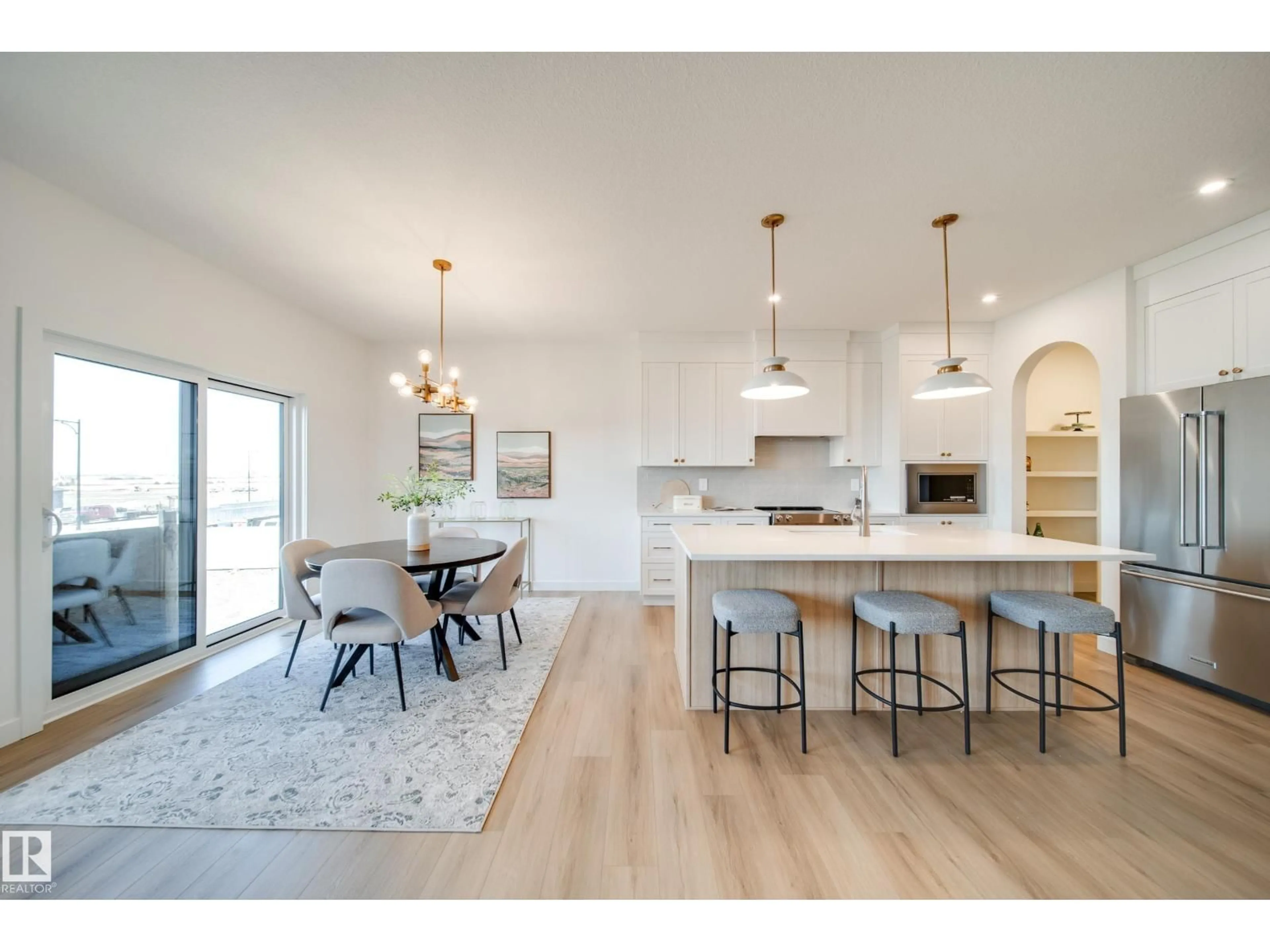 Open concept kitchen, wood/laminate floor for 54 CLICHY CL, St. Albert Alberta T8T2E3