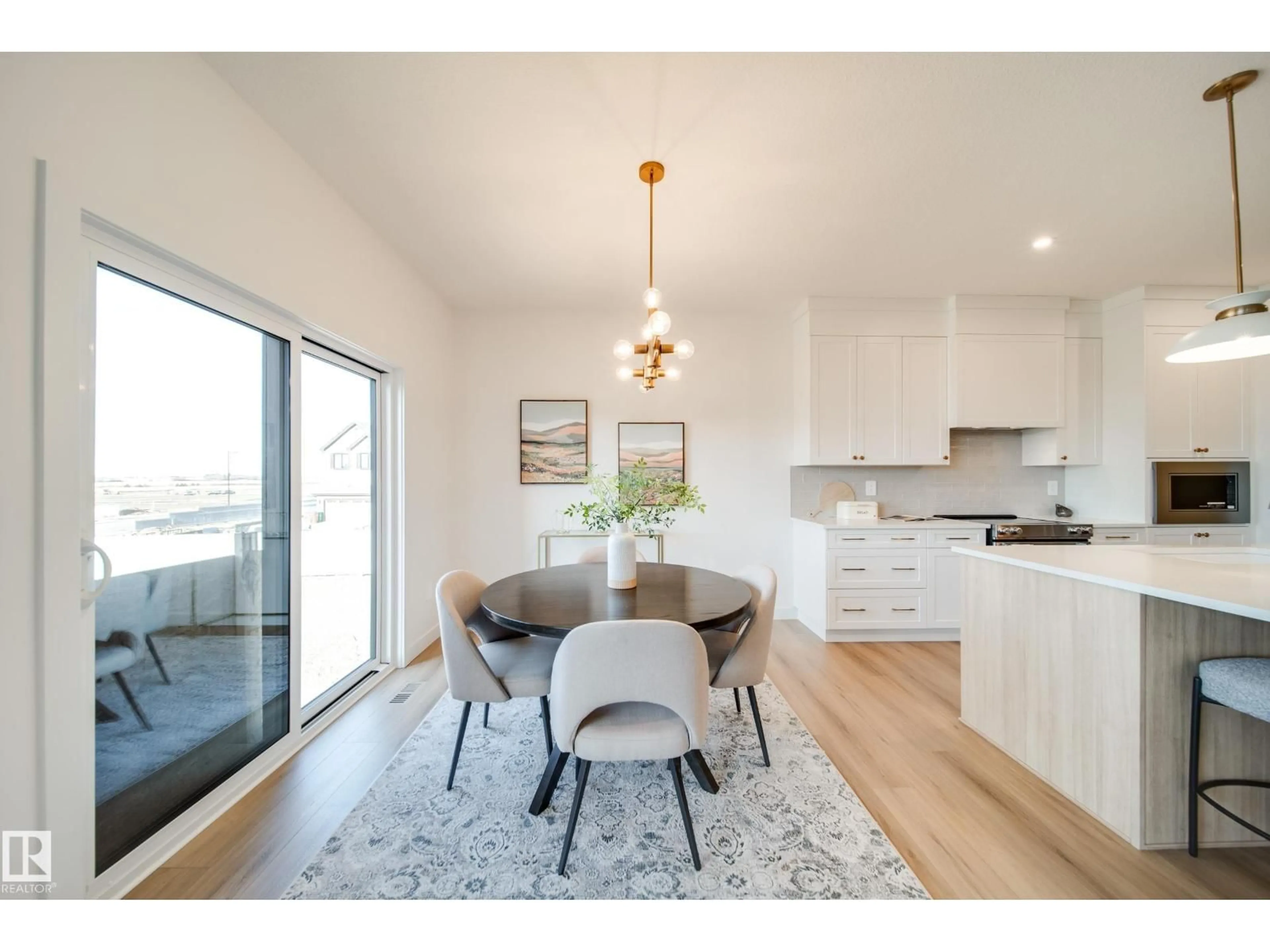 Open concept kitchen, wood/laminate floor for 54 CLICHY CL, St. Albert Alberta T8T2E3