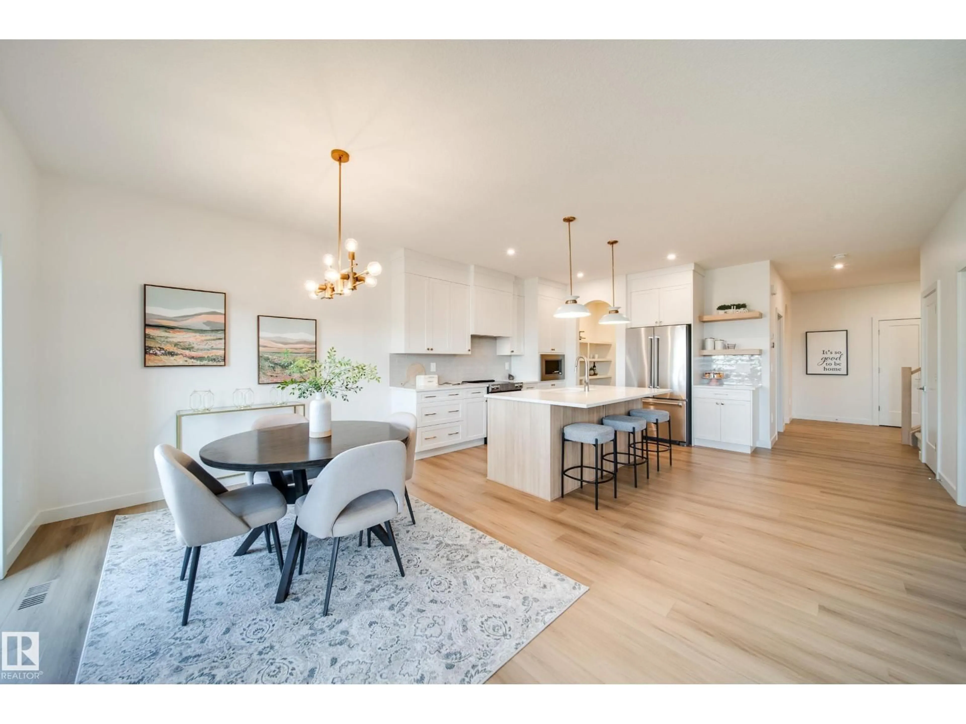 Open concept kitchen, wood/laminate floor for 54 CLICHY CL, St. Albert Alberta T8T2E3