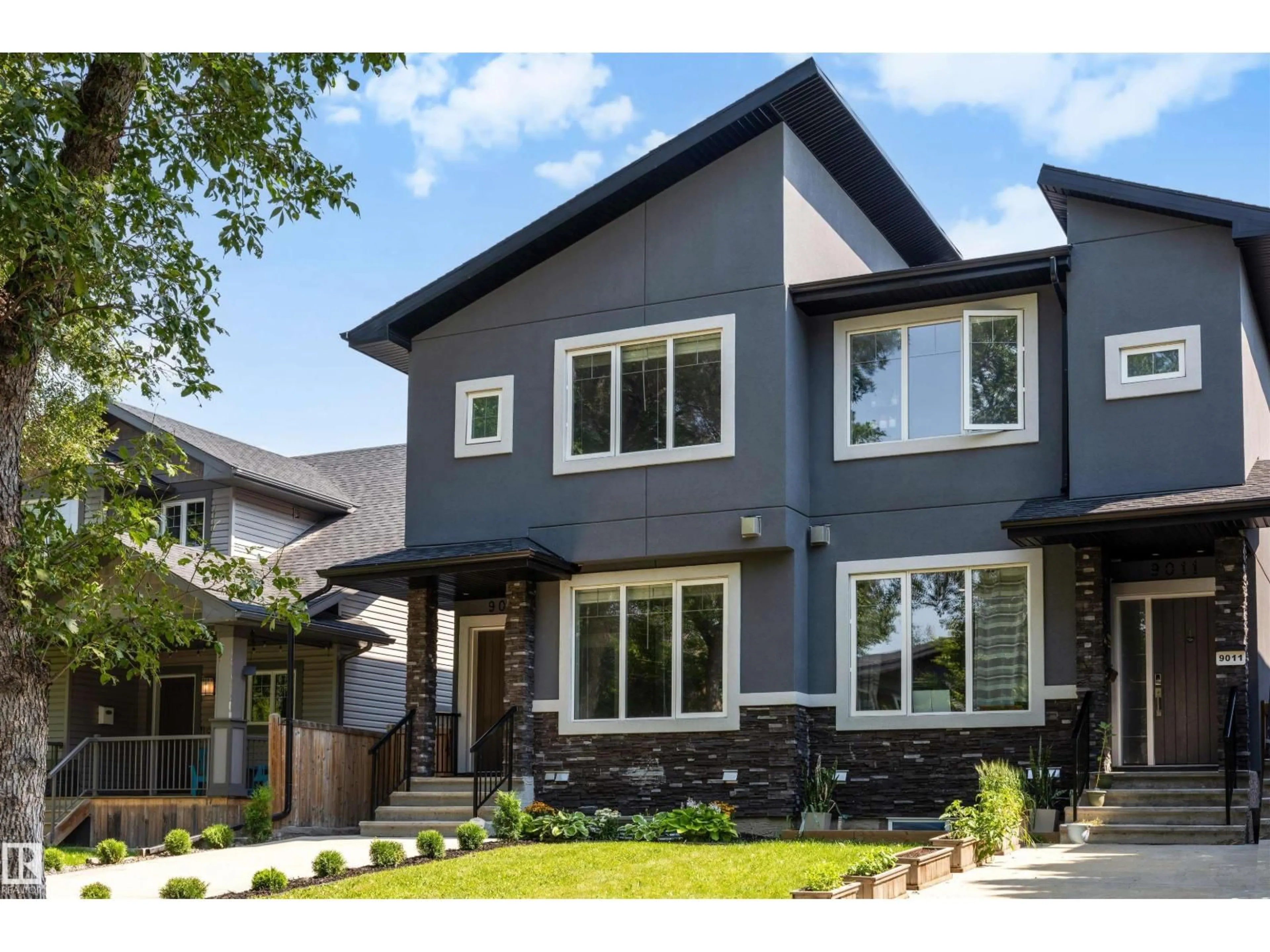 Home with brick exterior material, street for NW - 9013 90 ST, Edmonton Alberta T6C3L8