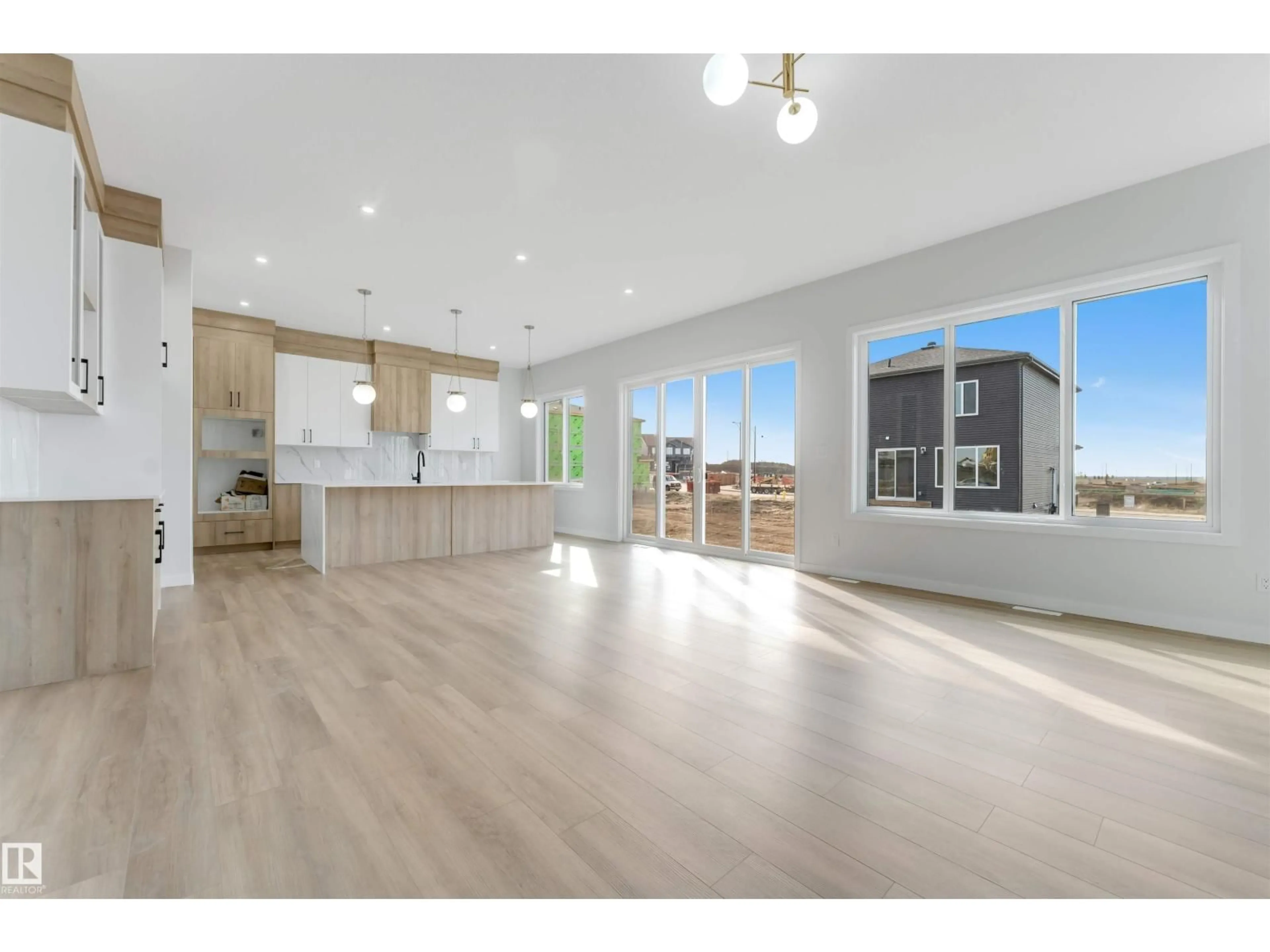 Open concept kitchen, wood/laminate floor for 174 CORRAL CI, Sherwood Park Alberta T8A4V2
