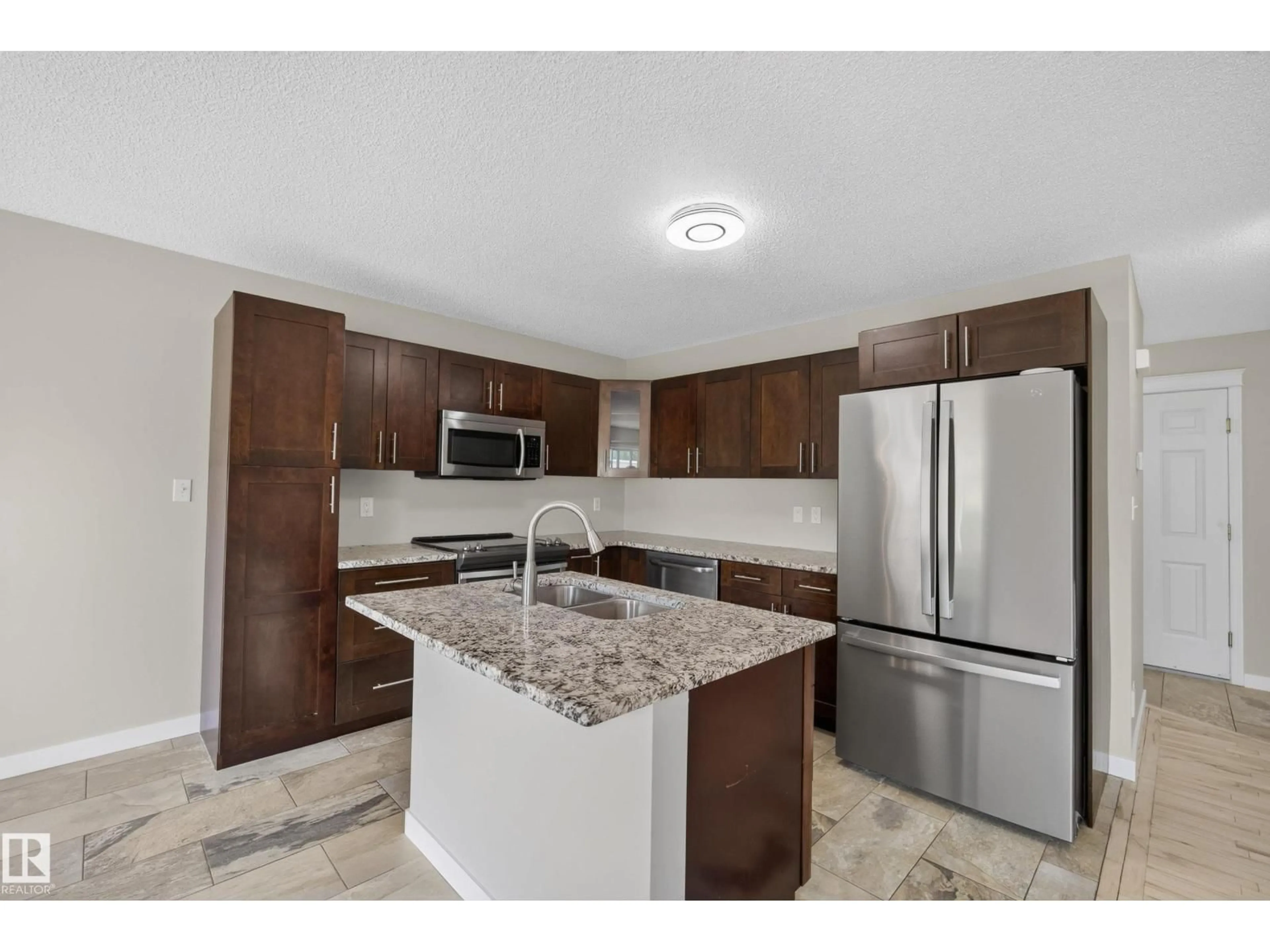Open concept kitchen, ceramic/tile floor for 152 BRIGHTON BA, Sherwood Park Alberta T8H2C2