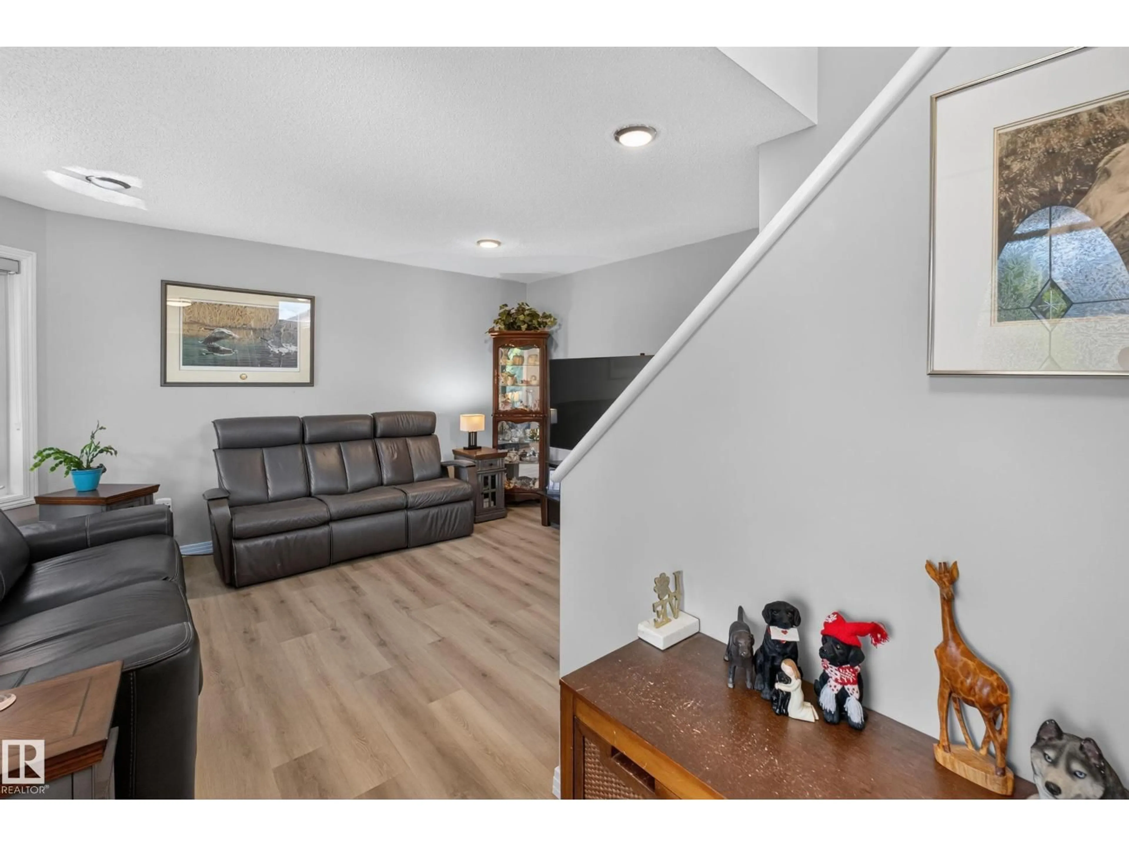 Living room with furniture, wood/laminate floor for 79 SUMMERFIELD WD, Sherwood Park Alberta T5H2P5