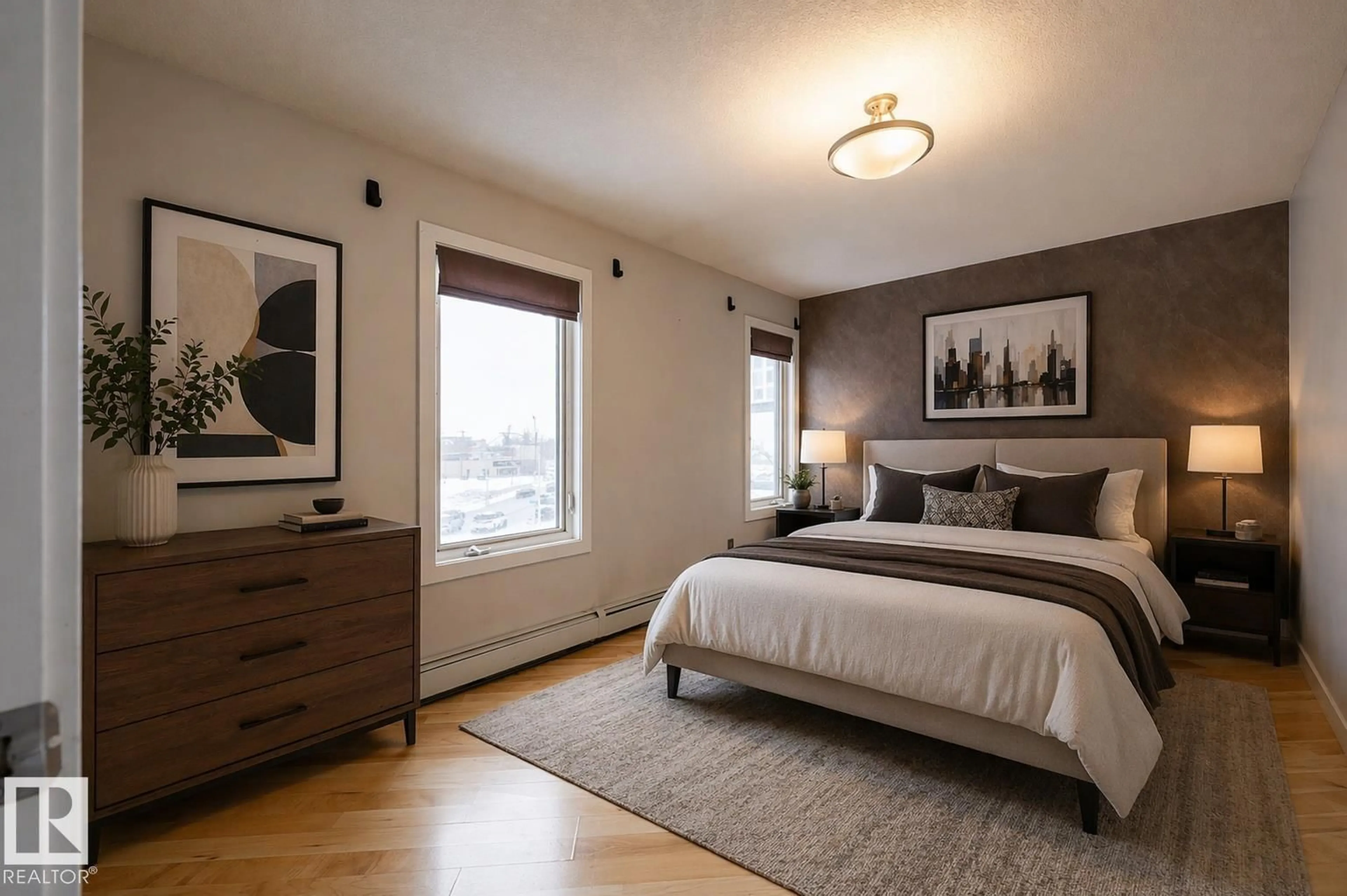 Bedroom with bed, wood/laminate floor for 304 - 9336 JASPER AV, Edmonton Alberta T5H3T5