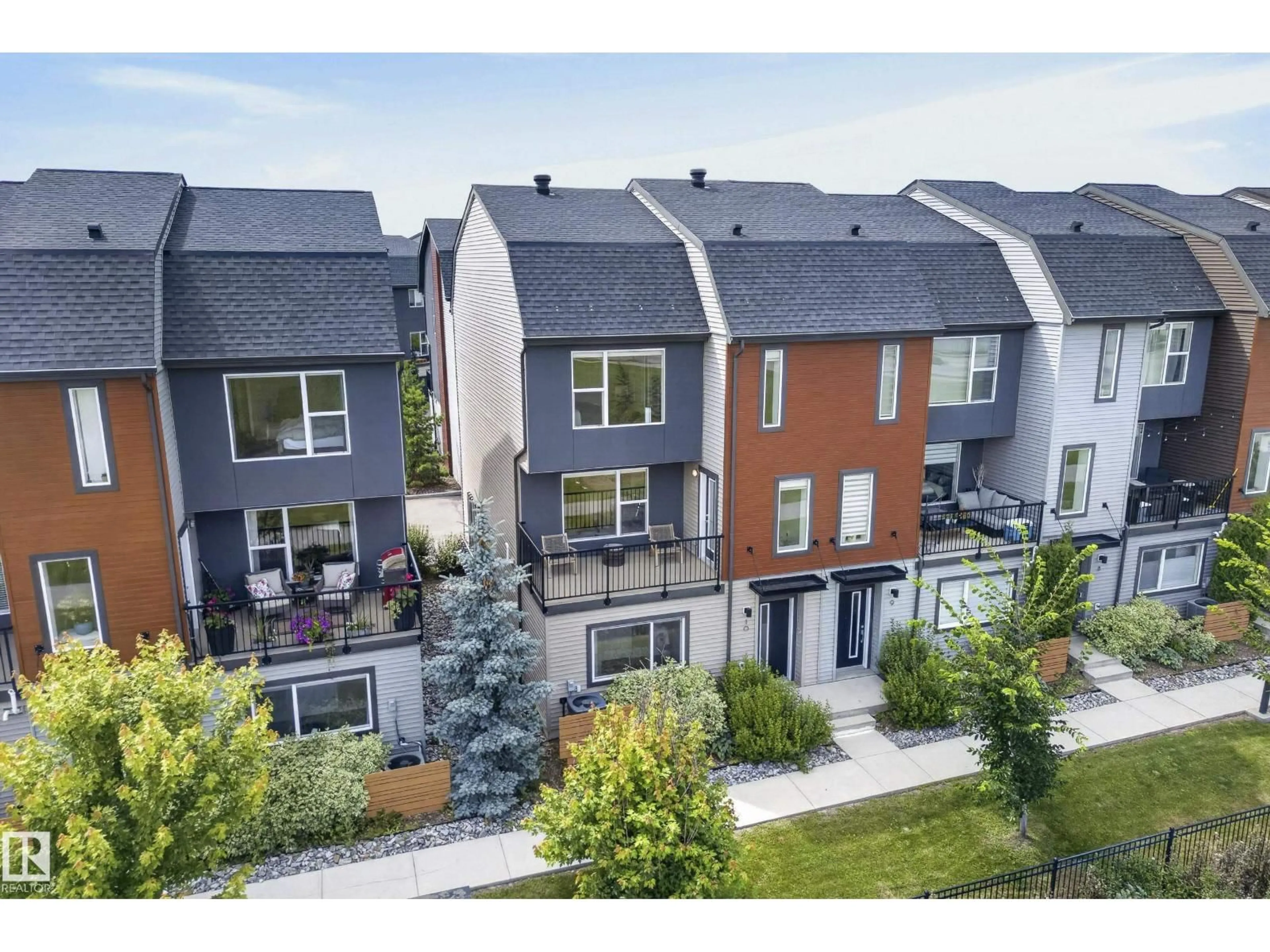 A pic from outside/outdoor area/front of a property/back of a property/a pic from drone, street for #10 - 1075 ROSENTHAL BV, Edmonton Alberta T5T7G5