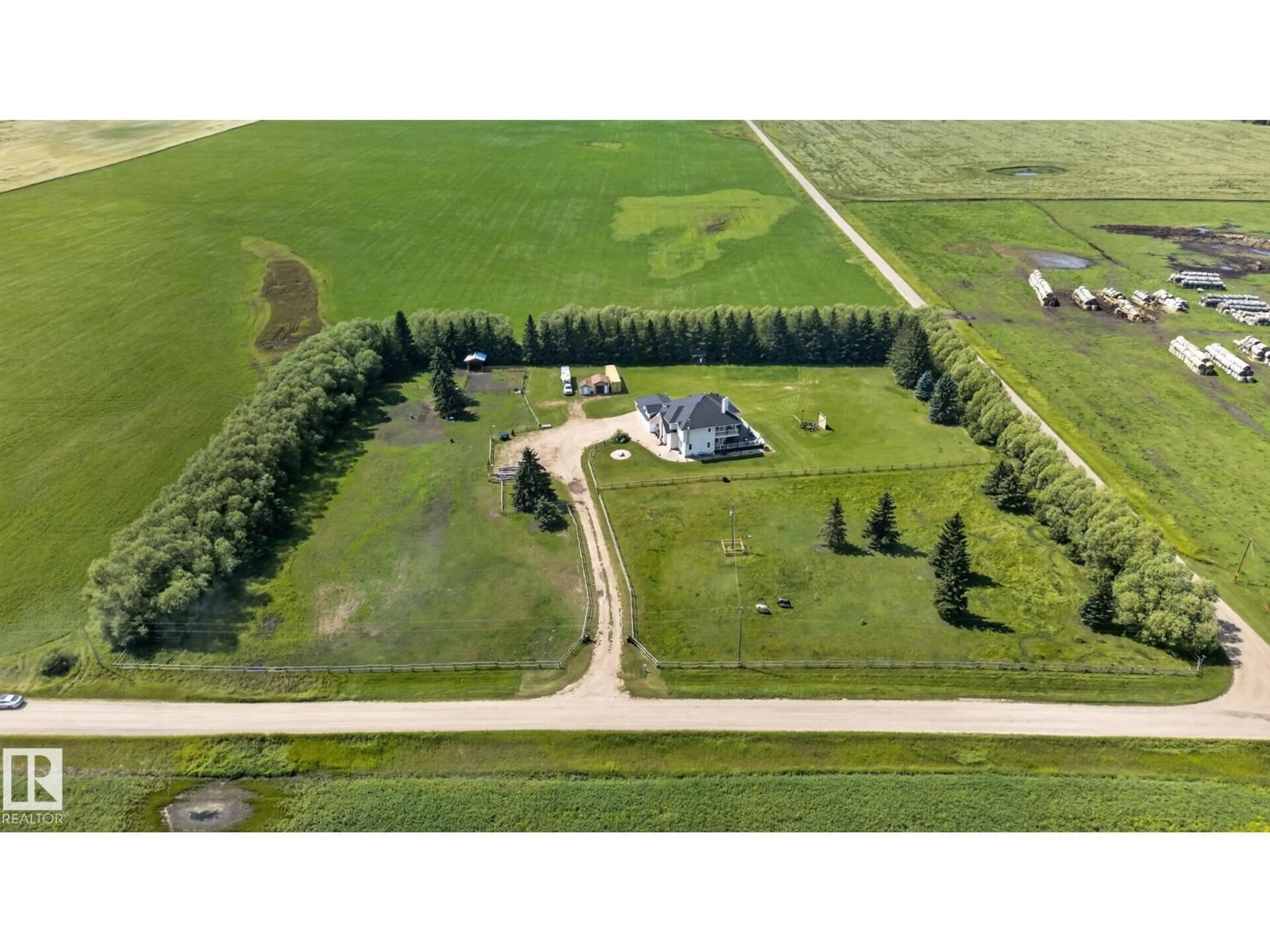 A pic from outside/outdoor area/front of a property/back of a property/a pic from drone, unknown for 50336 RANGE ROAD 280, Rural Leduc County Alberta T0C0V0