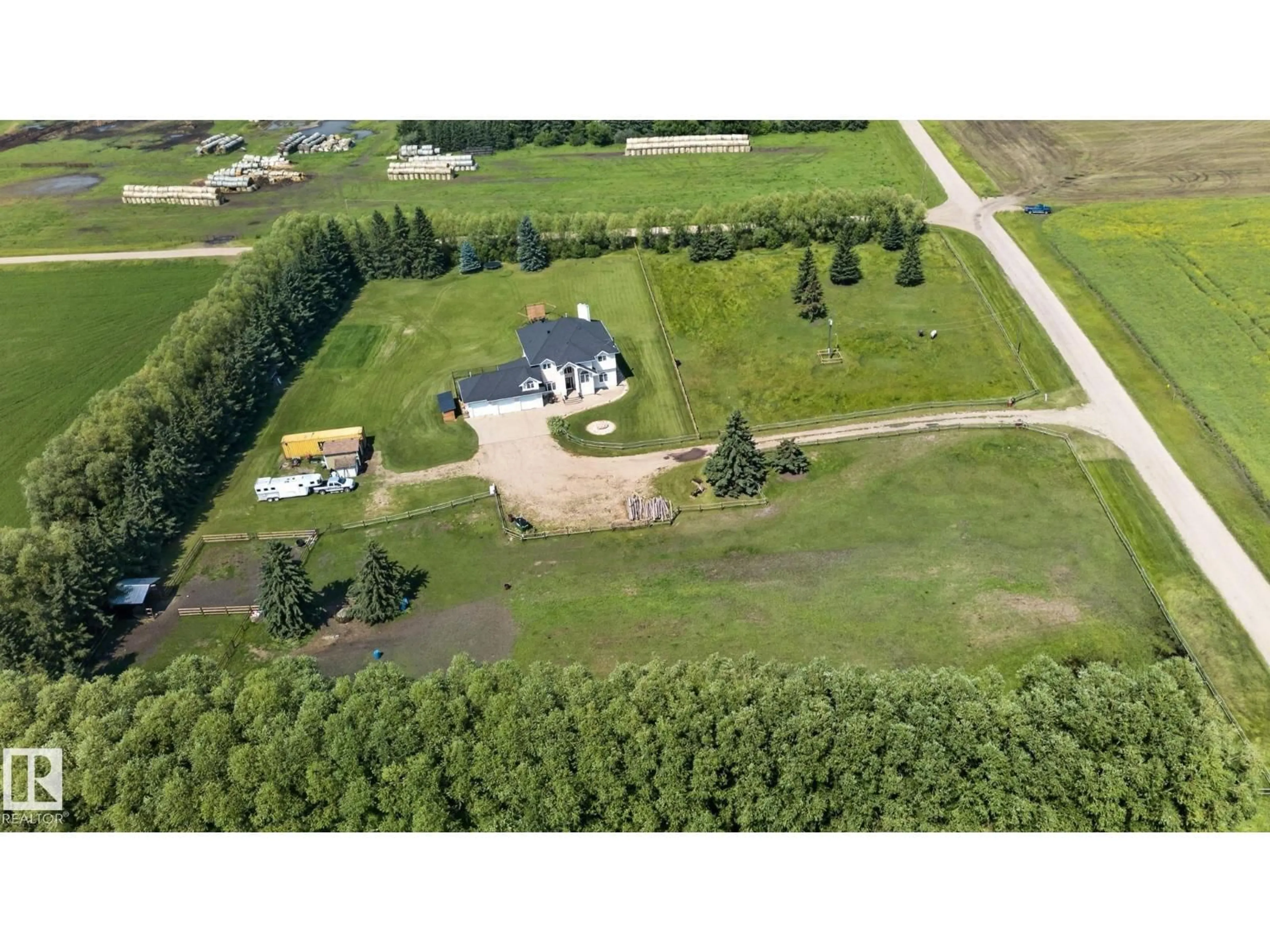 A pic from outside/outdoor area/front of a property/back of a property/a pic from drone, forest/trees view for 50336 RANGE ROAD 280, Rural Leduc County Alberta T0C0V0