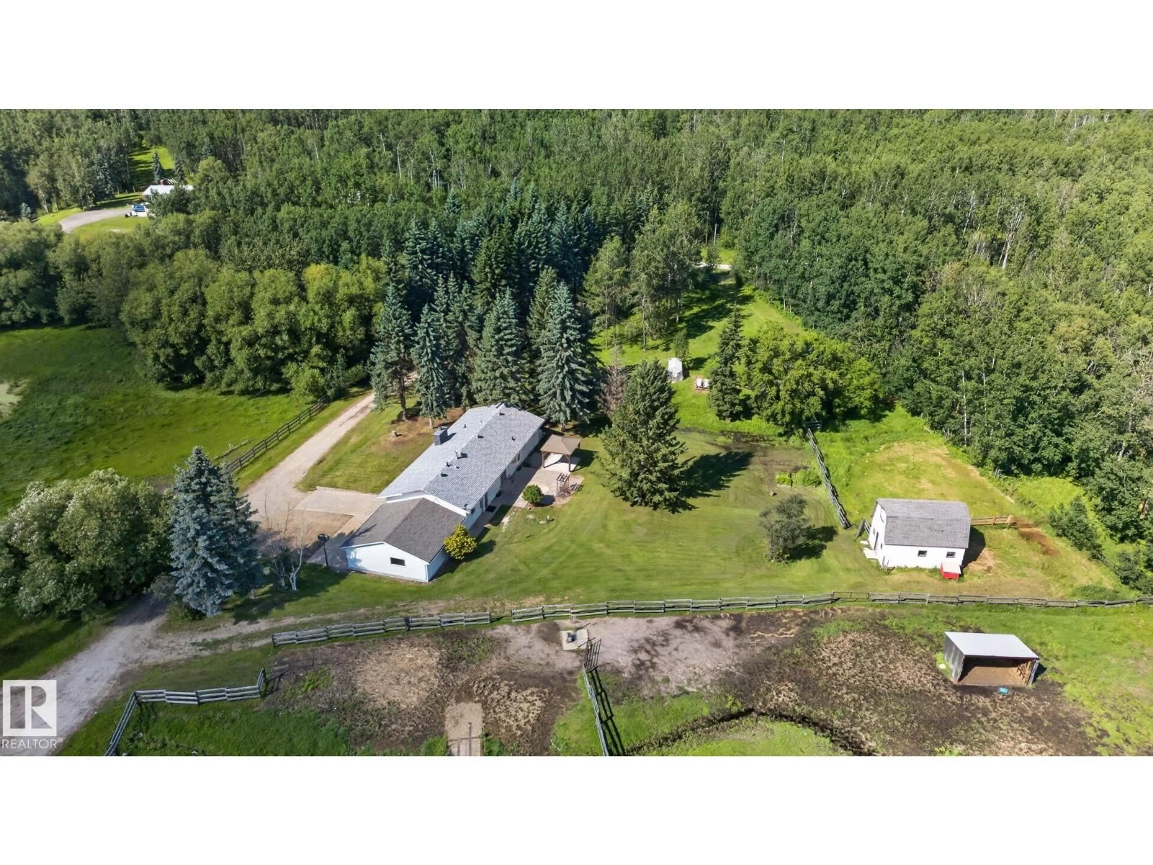 A pic from outside/outdoor area/front of a property/back of a property/a pic from drone, unknown for #25 - 52561 RGE ROAD 214, Rural Strathcona County Alberta T8E2H4