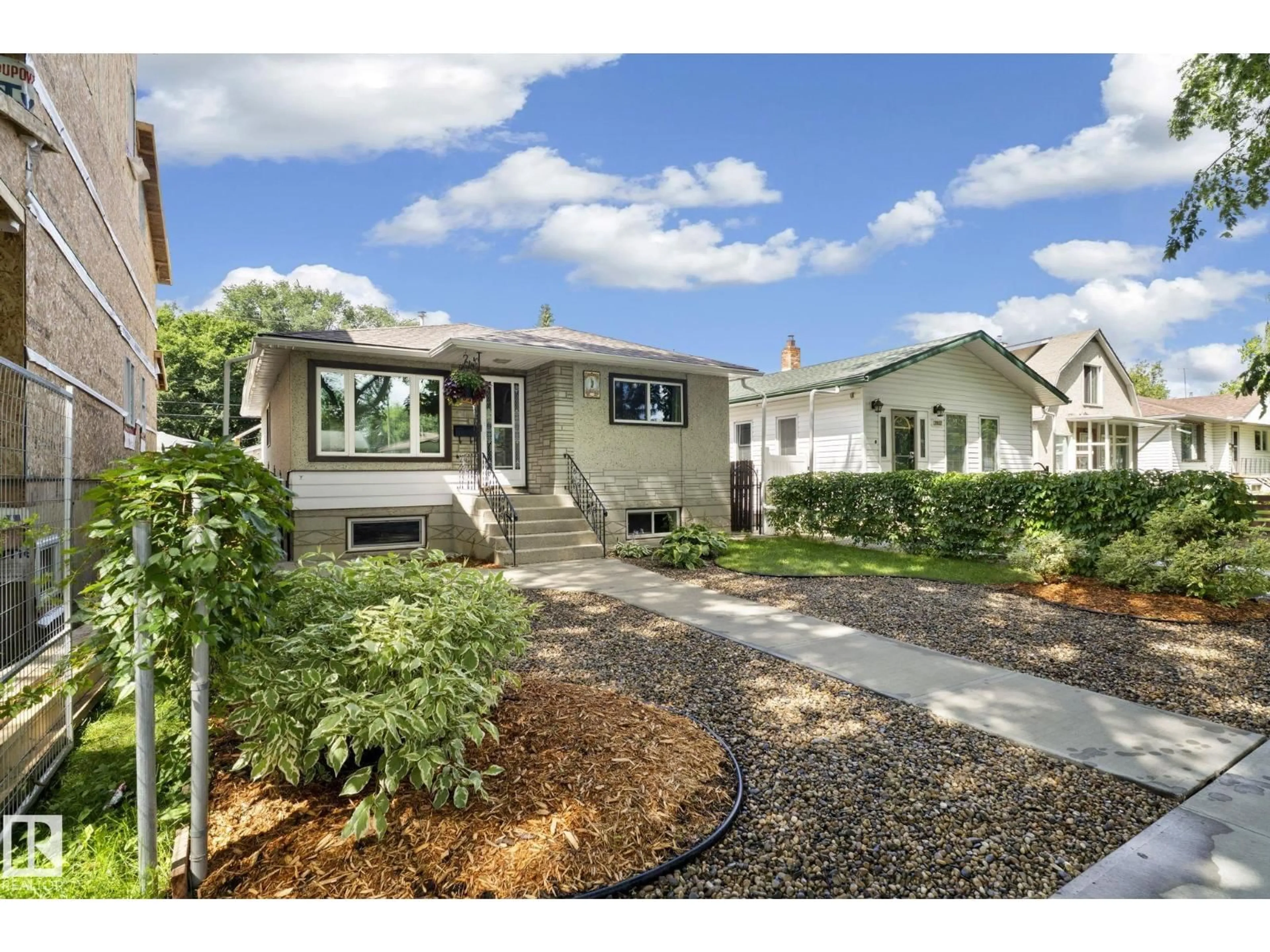 Home with vinyl exterior material, street for NW - 12030 56 ST, Edmonton Alberta T5W3T1