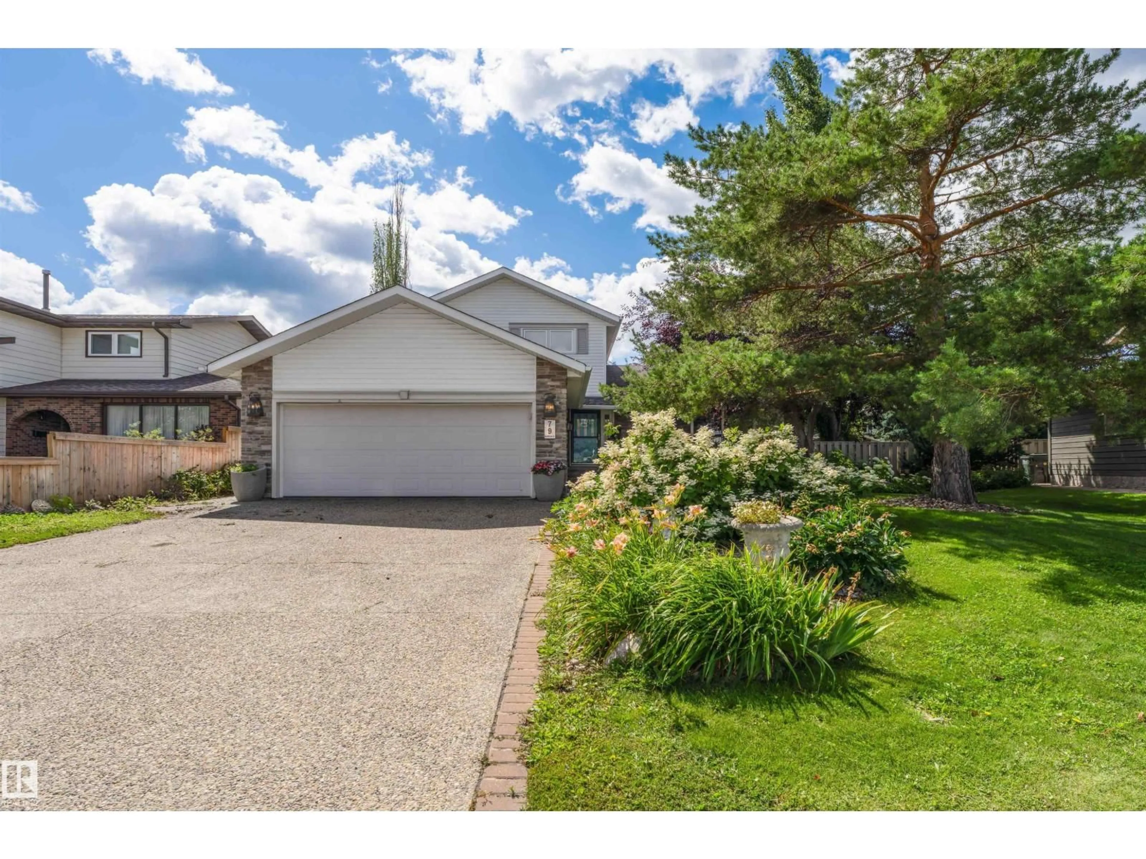 A pic from outside/outdoor area/front of a property/back of a property/a pic from drone, street for 79 WOODSTOCK DR, Sherwood Park Alberta T8A4C2